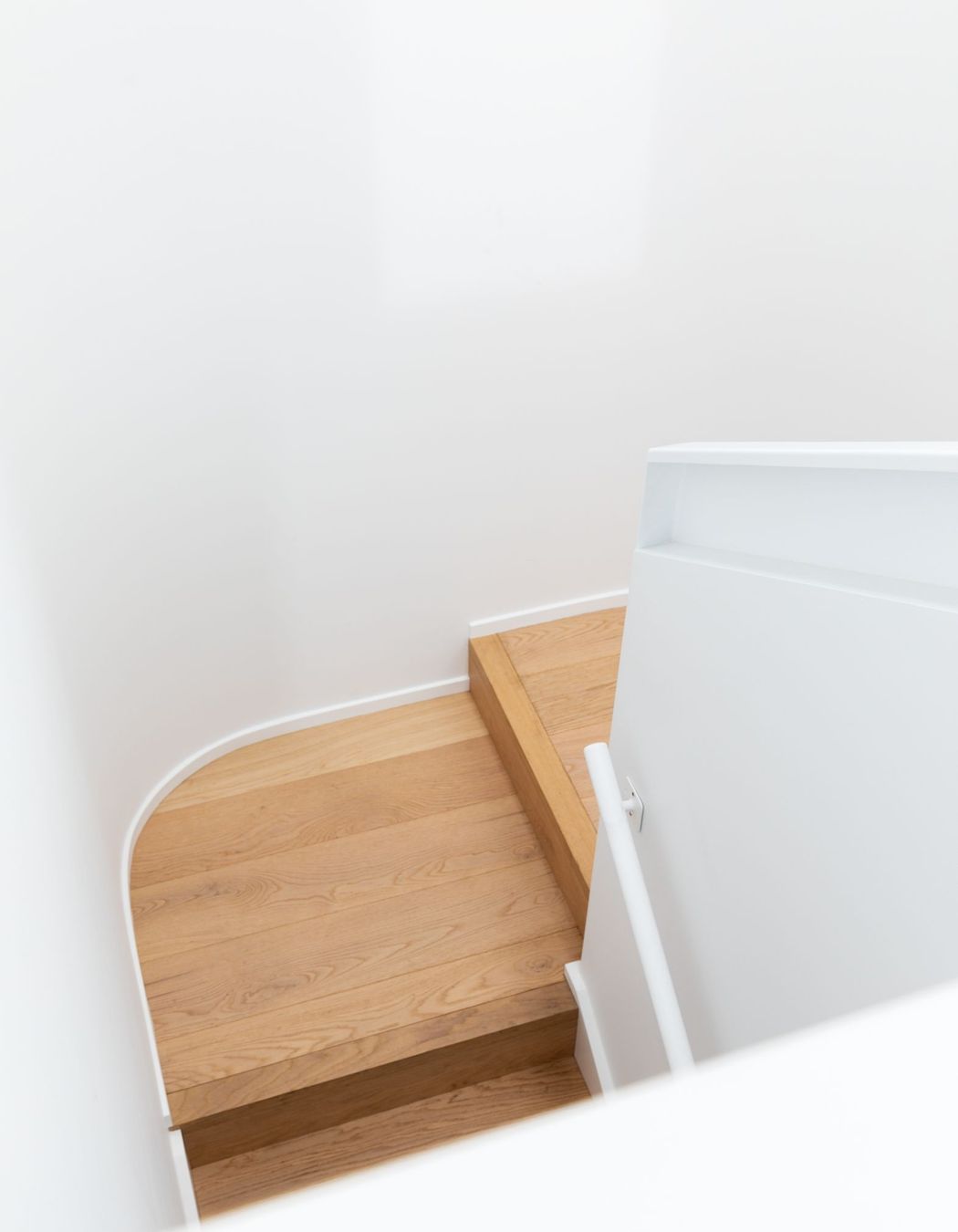 Stair. Featuring custom designed steel rail.