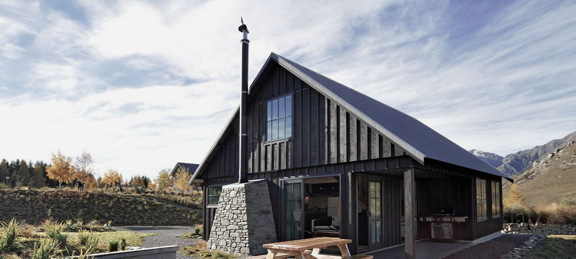 River Stone Hut banner