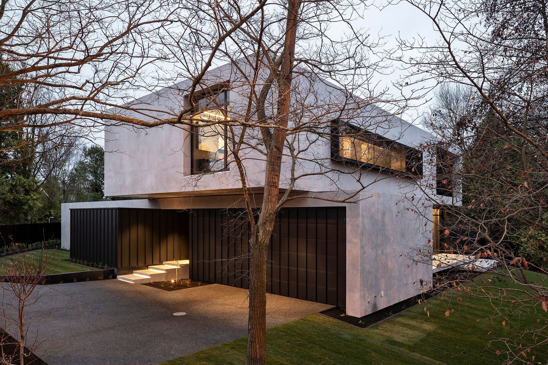 The site came with a 14-metre setback from the river, however, resource consent for a like-for-like rebuild meant the new house was able to inhabit most of the original footprint of the previous 1950s-era home.