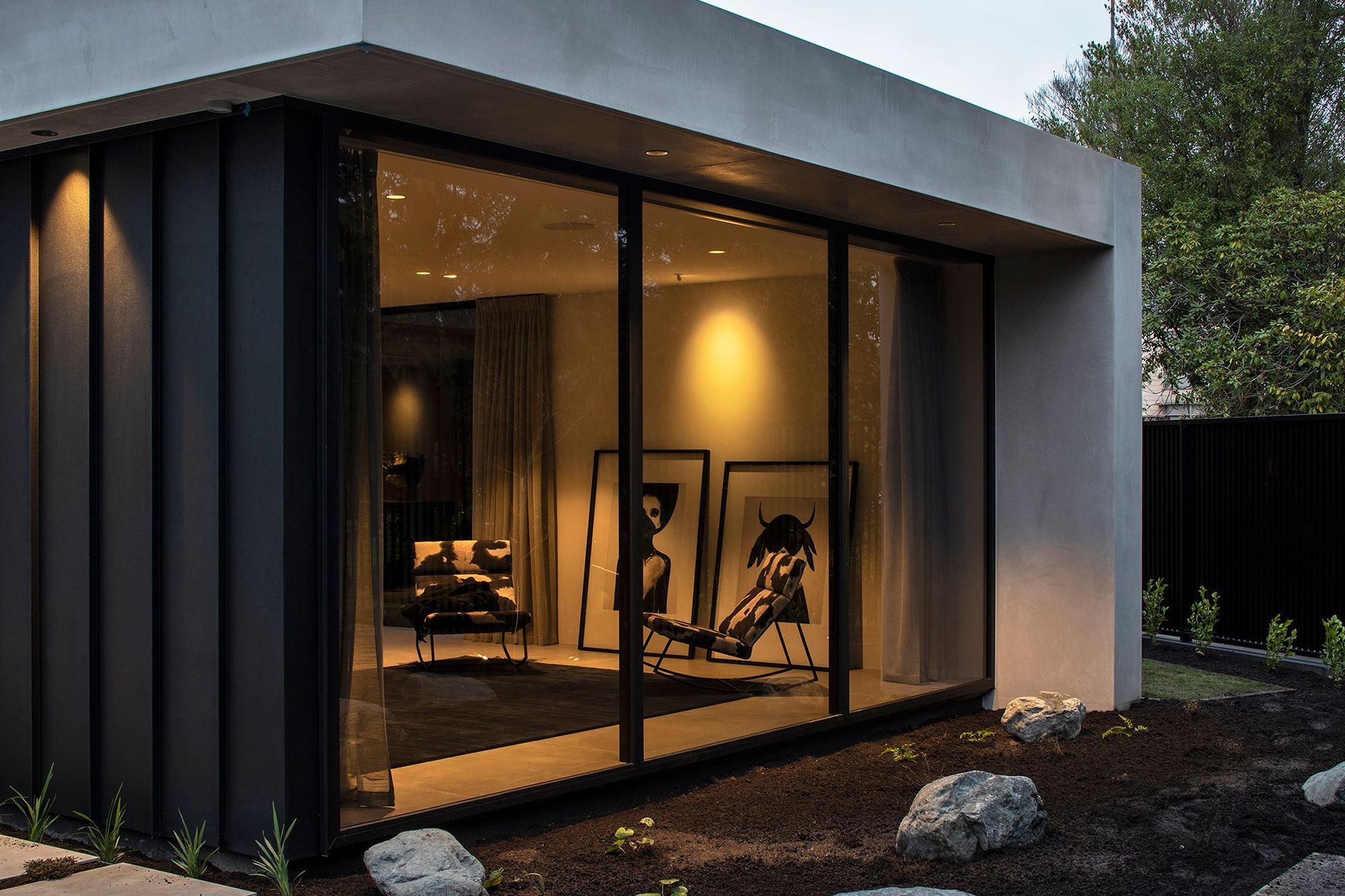 The ground floor comprises a series of open and inter-connected living areas, which, while the look is restrained and minimal, do not feel stark or sterile.