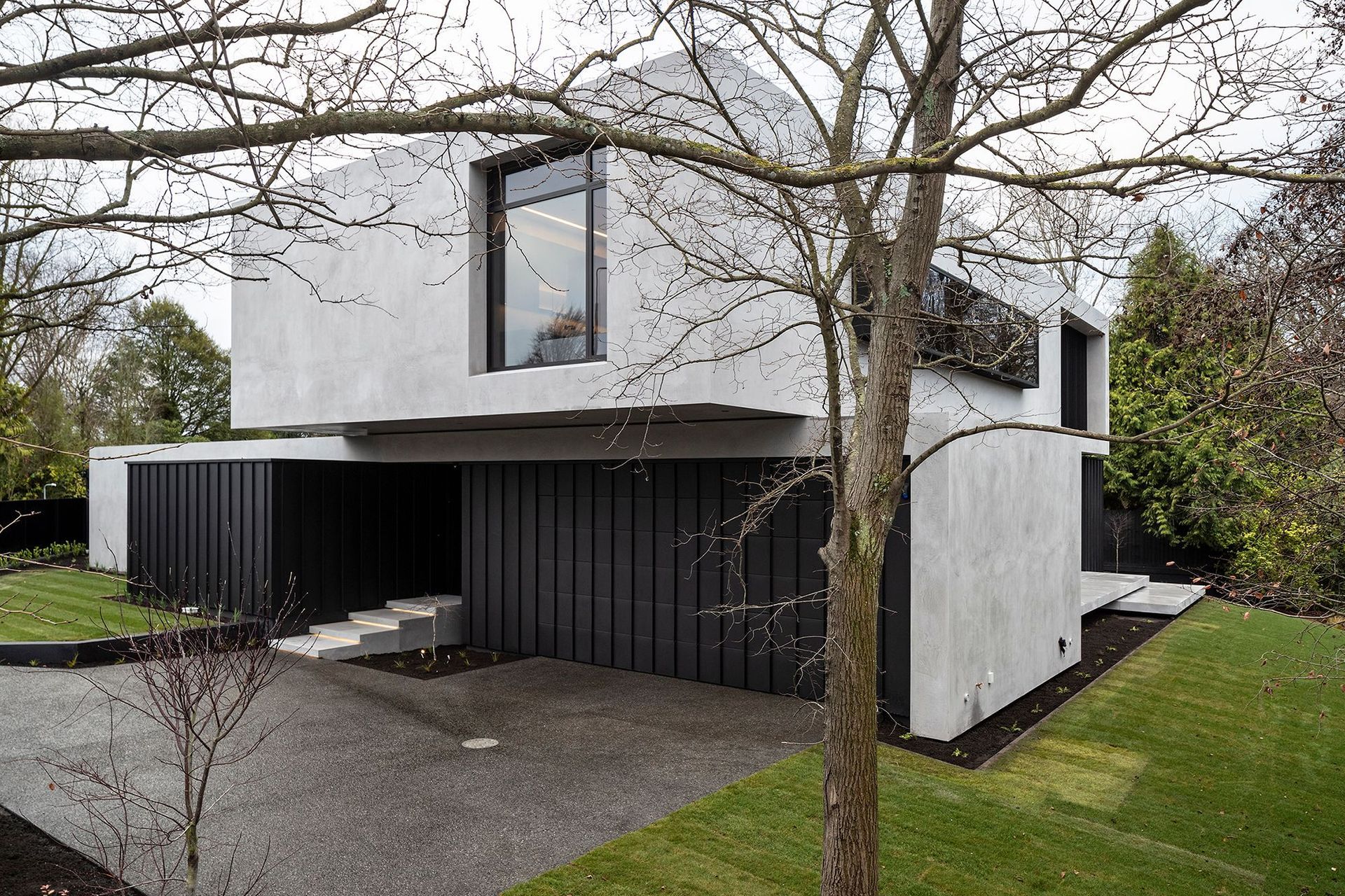 As a nod to the clients' request for a insitu concrete house, which, unfortunately, due to ground conditions was not possible, the exterior has been finished in a burnished concrete render.