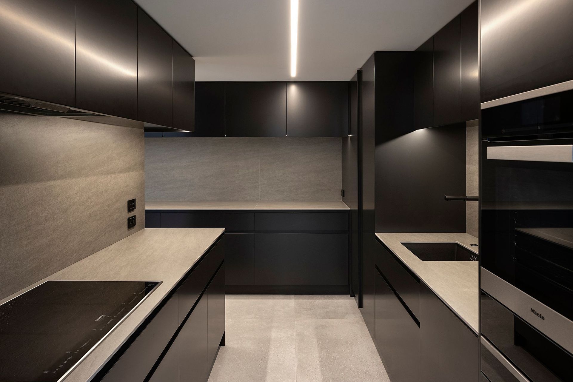 Located in a separate space, the working heart of the kitchen is removed from the living areas.
