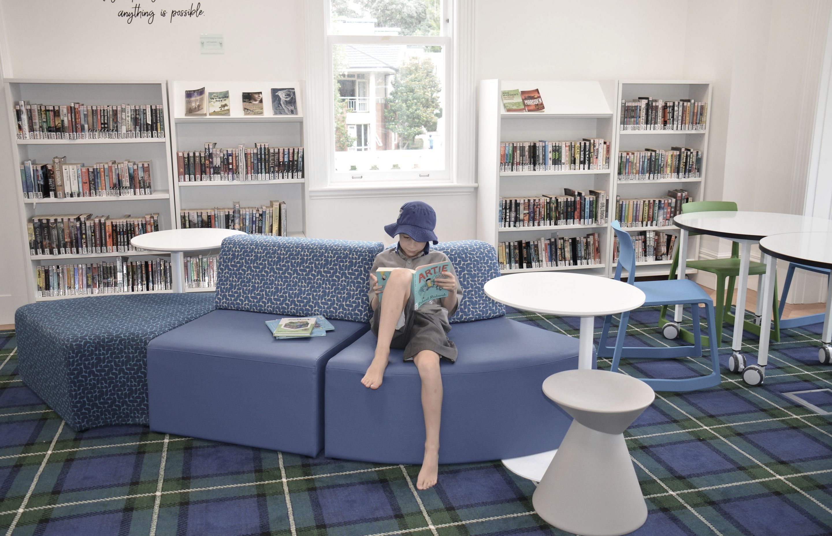Flexible furniture that allows dynamic body positions allowing kids to remain mentally engaged. Bespoke carpet designed in keeping with the school's tartain.