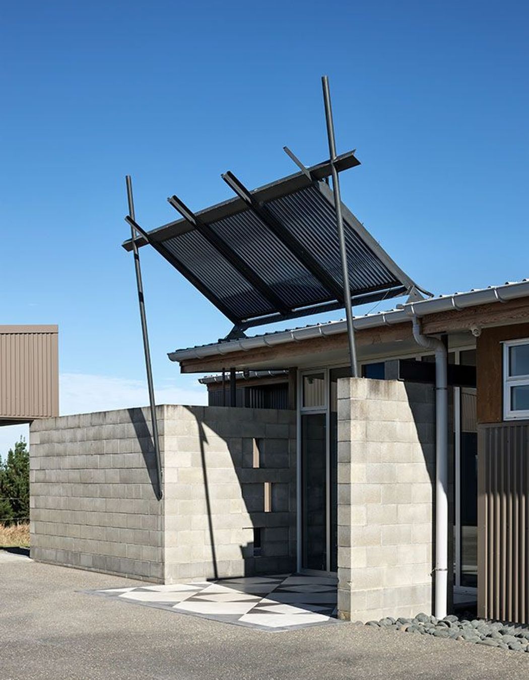 Contemporary entrance with textures a plenty.