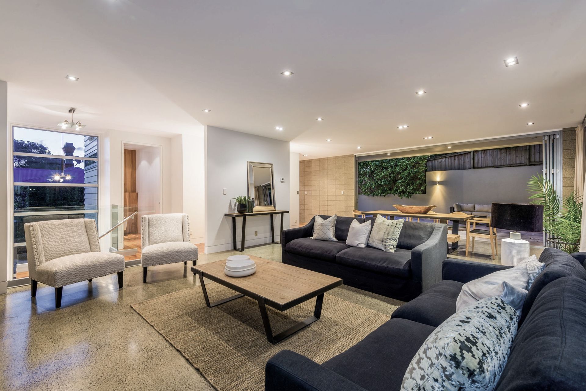 The Formal Living area is a light and open space borrowing light and views from the Park.