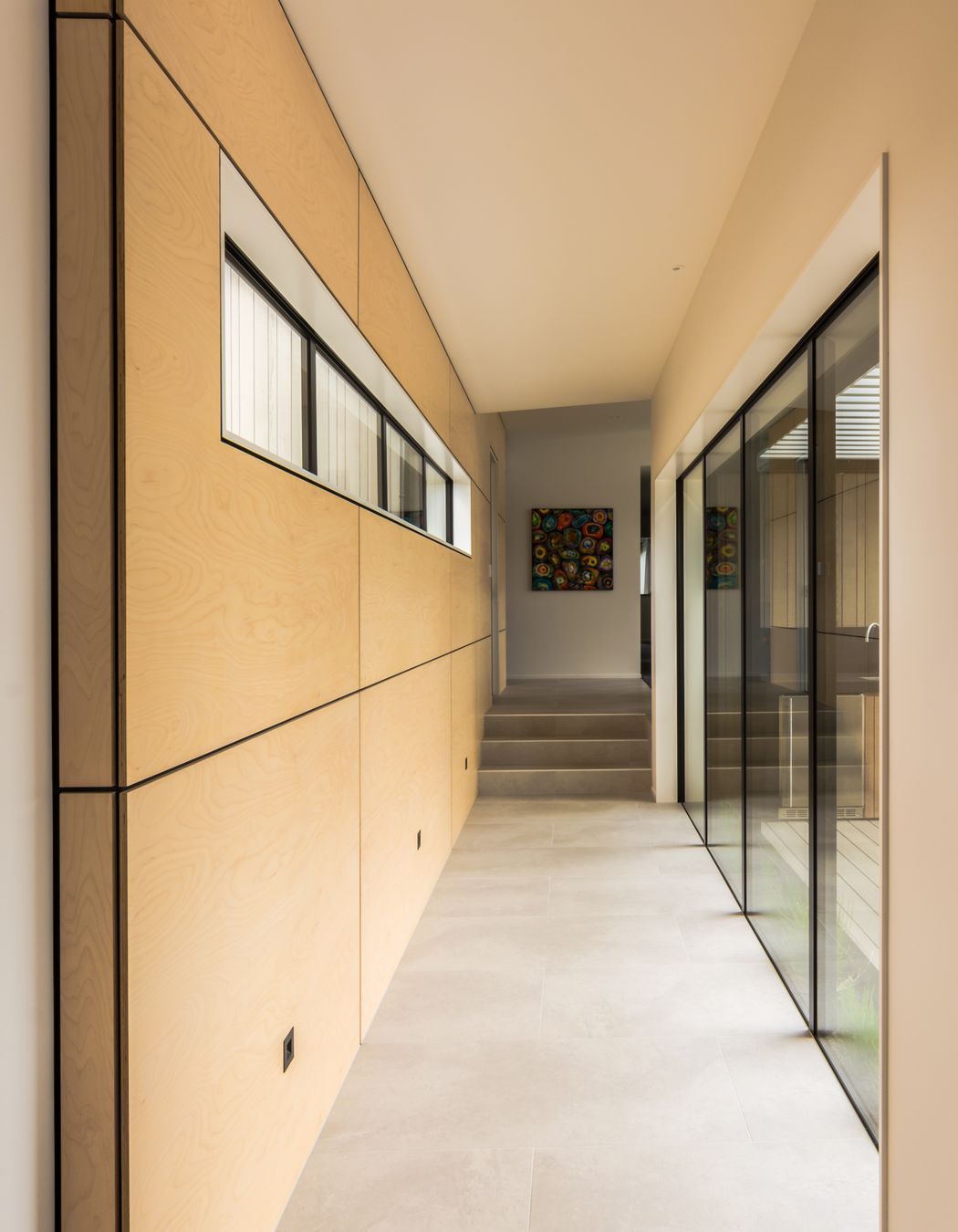 The blonded ply reflects the warmth of the day through the breezeway.