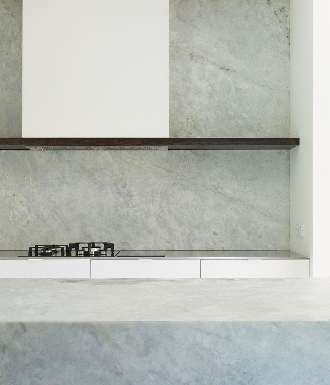 This low-maintenance kitchen is crisp and clean like the exterior of Ryan House.