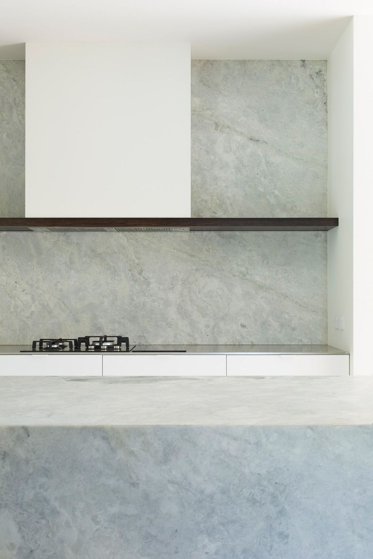 This low-maintenance kitchen is crisp and clean like the exterior of Ryan House.