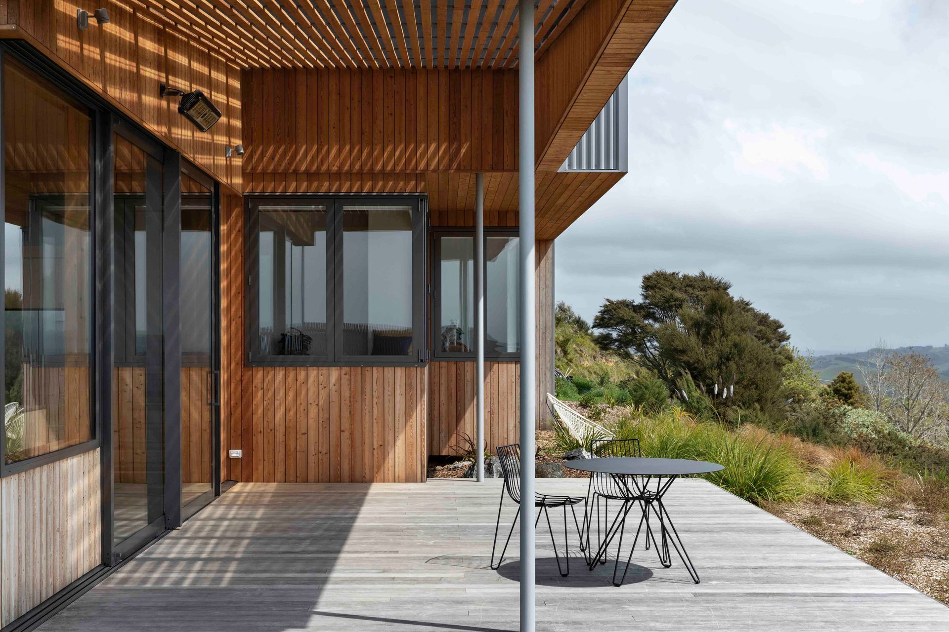 The back deck space is a sheltered spot to sit and enjoy the views.