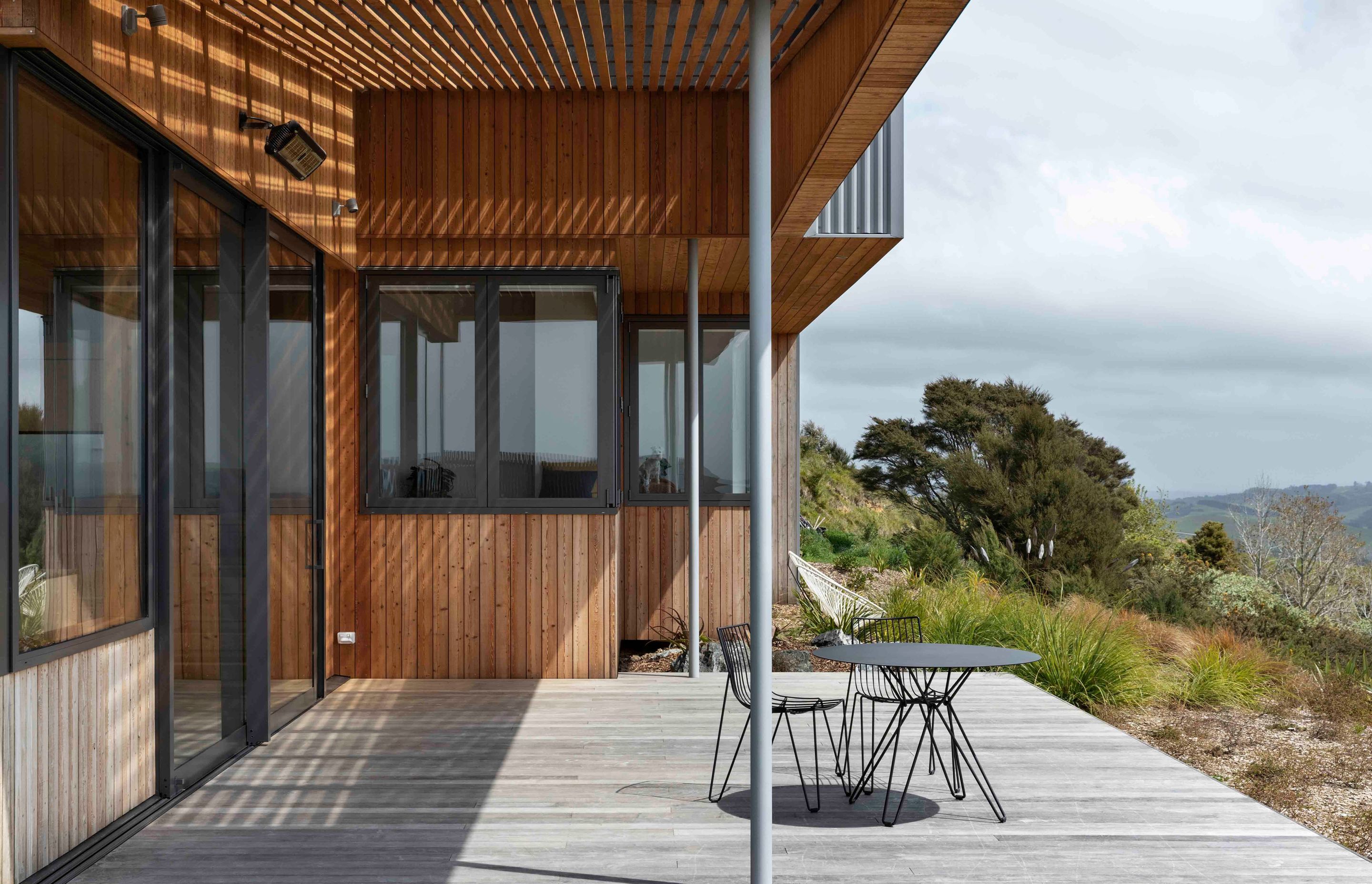 The back deck space is a sheltered spot to sit and enjoy the views.