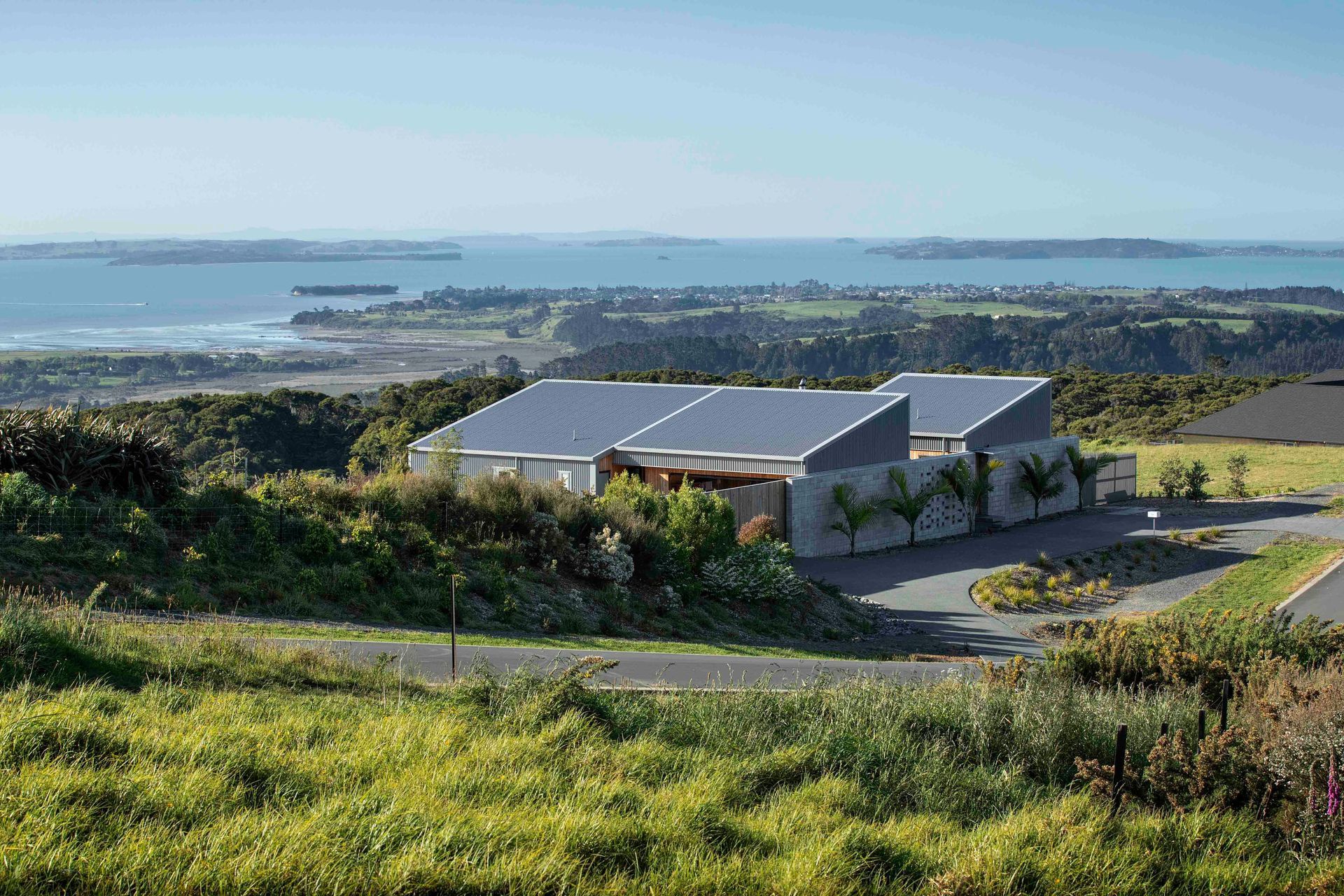  In spite of being located in a subdivision, the house enjoys a very strong sense of privacy, and unobstructed coastal views.