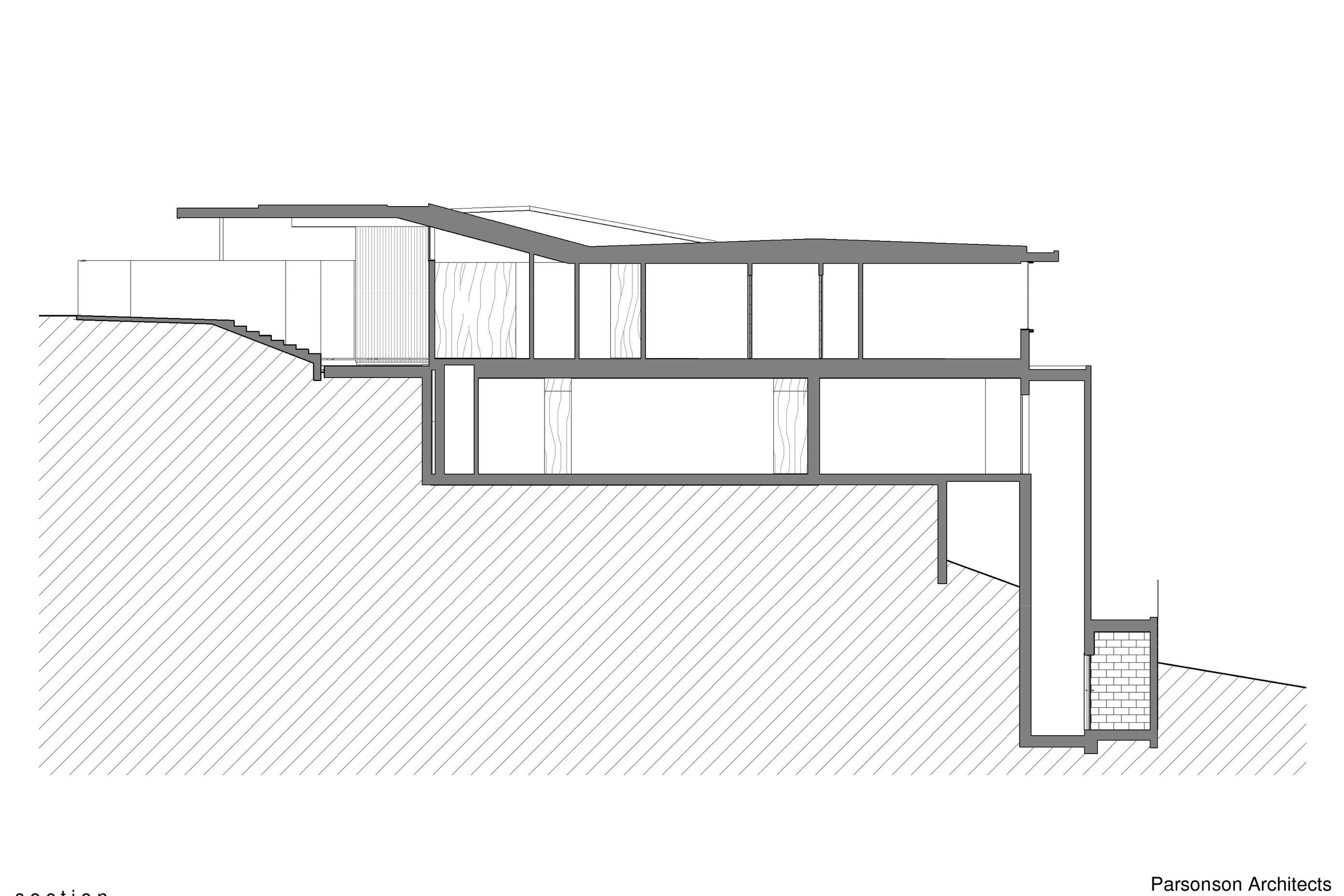 The section cuts through the house and shows the lift up from Salmont Place on the right and the gull-wing shaped roof.