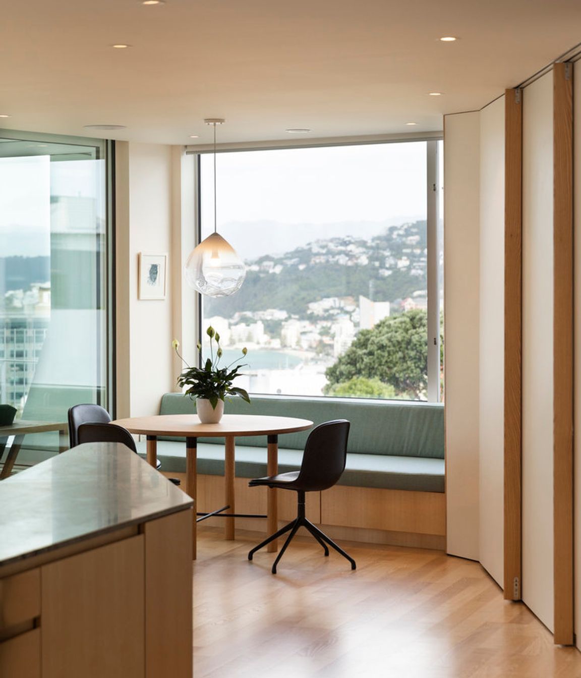 The upstairs breakfast dining area has a view over the harbour.