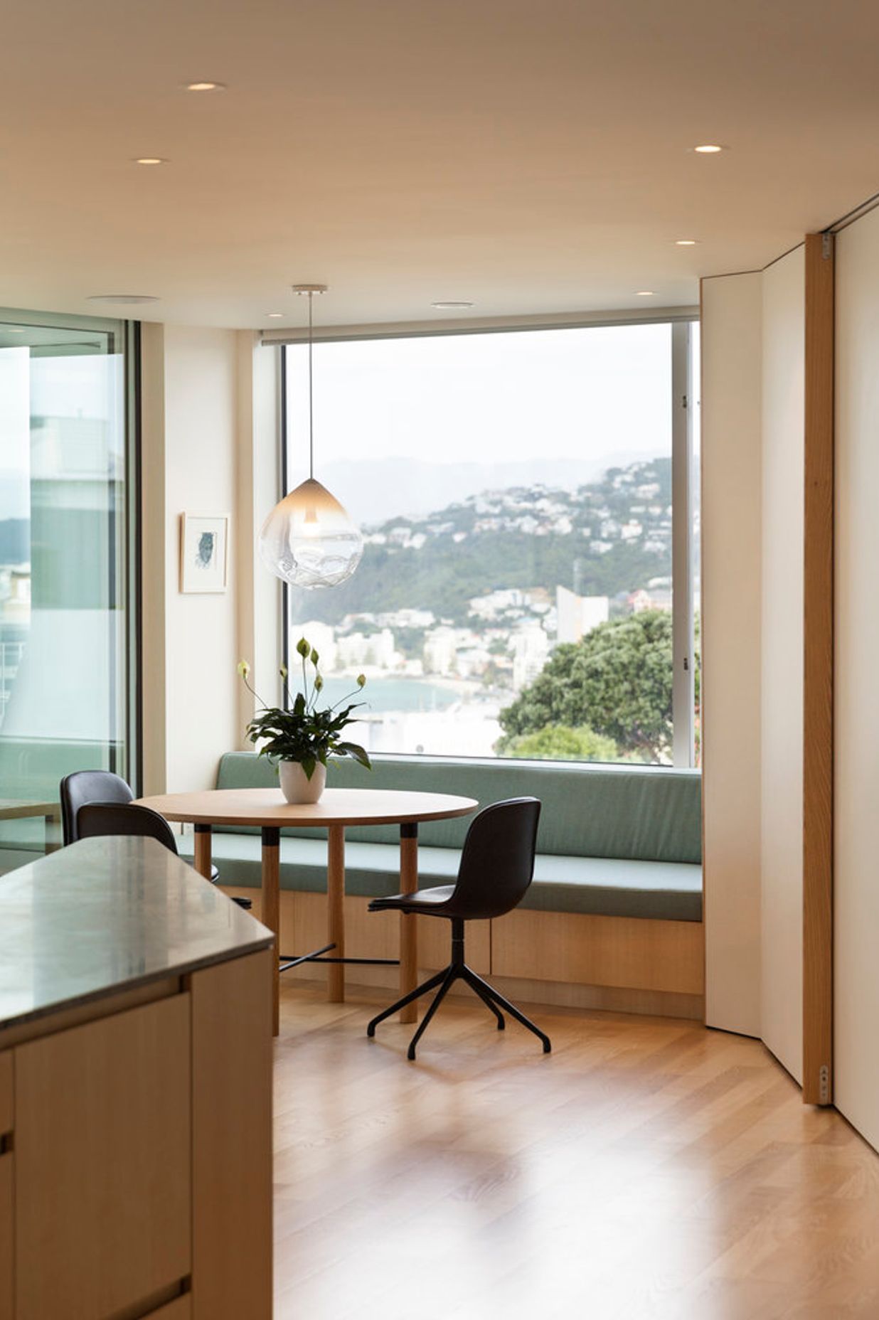 The upstairs breakfast dining area has a view over the harbour.