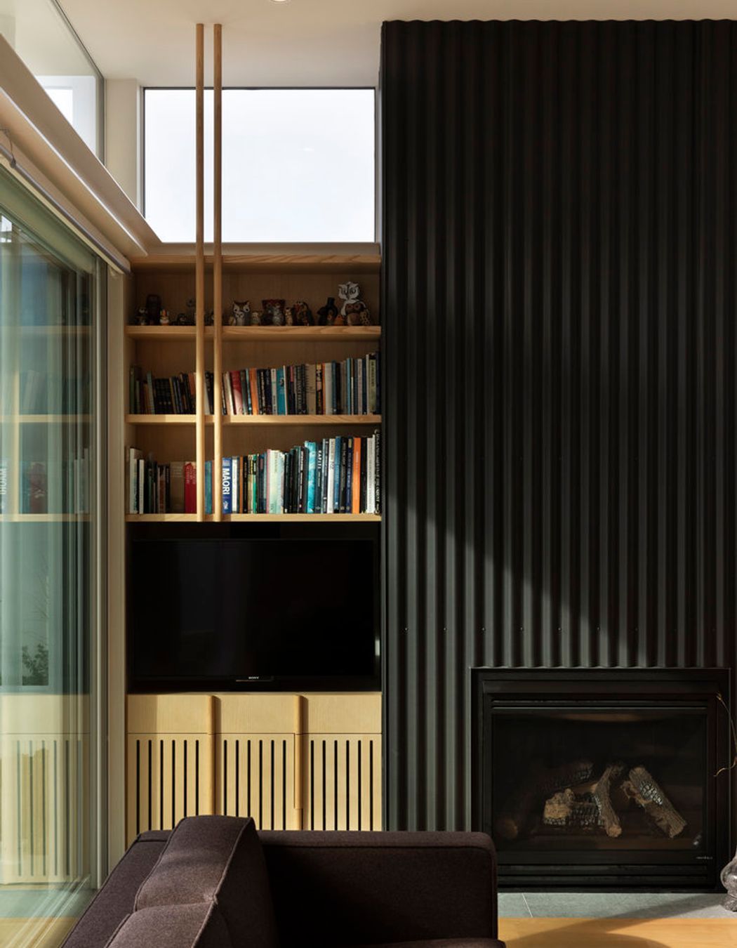 The house features bespoke American ash cabinetry designed by the architect.