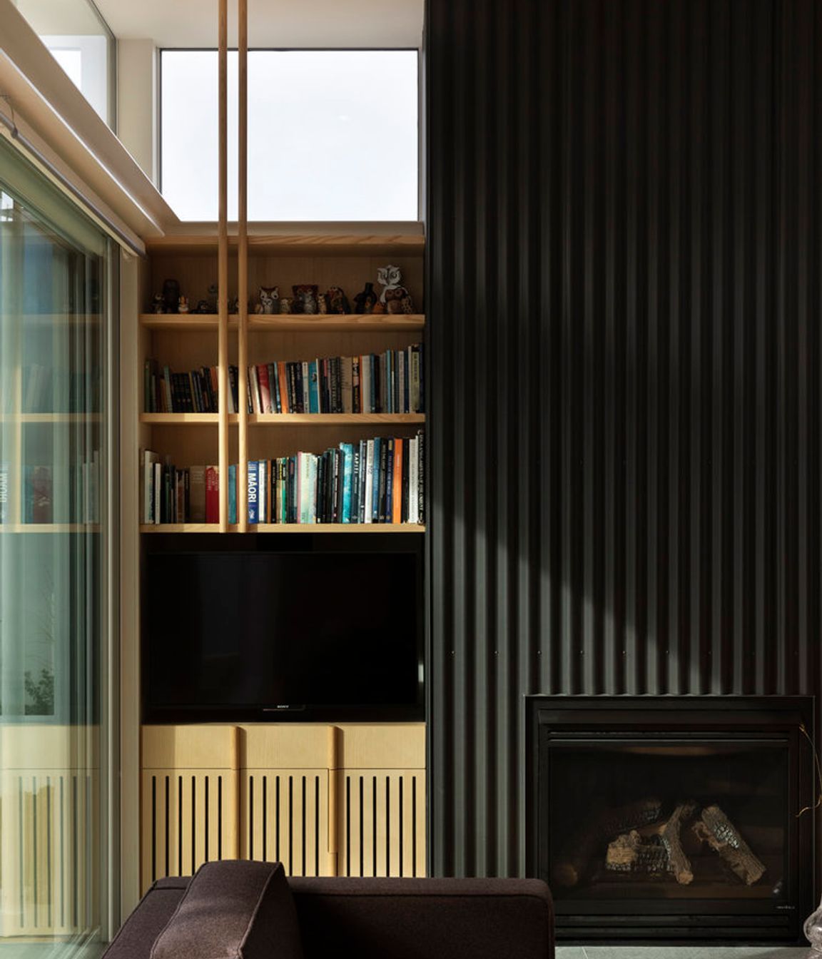 The house features bespoke American ash cabinetry designed by the architect.