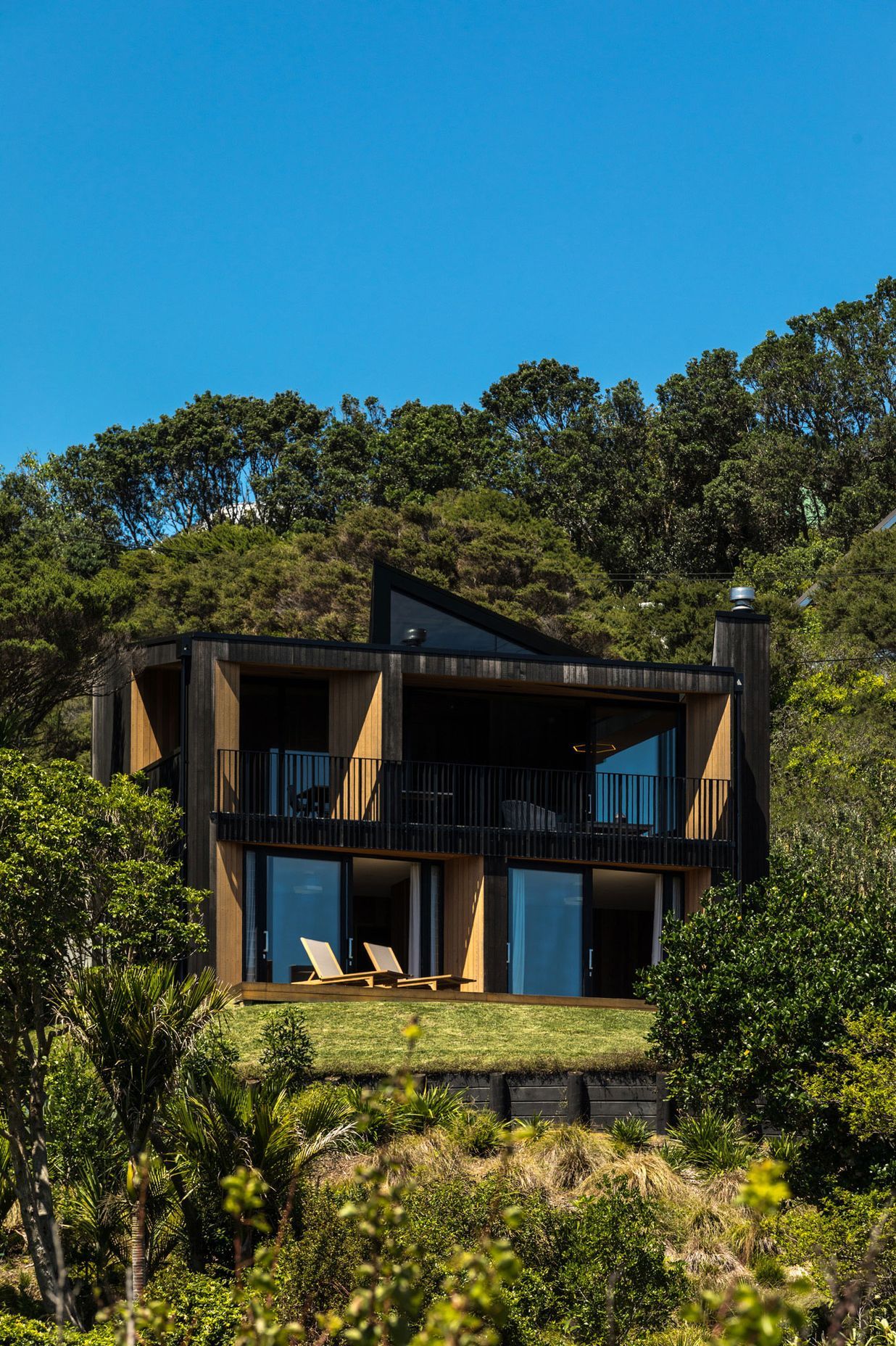 The house sits at the top of a subdivided site with neighbours on all sides yet still retains a sense of priva