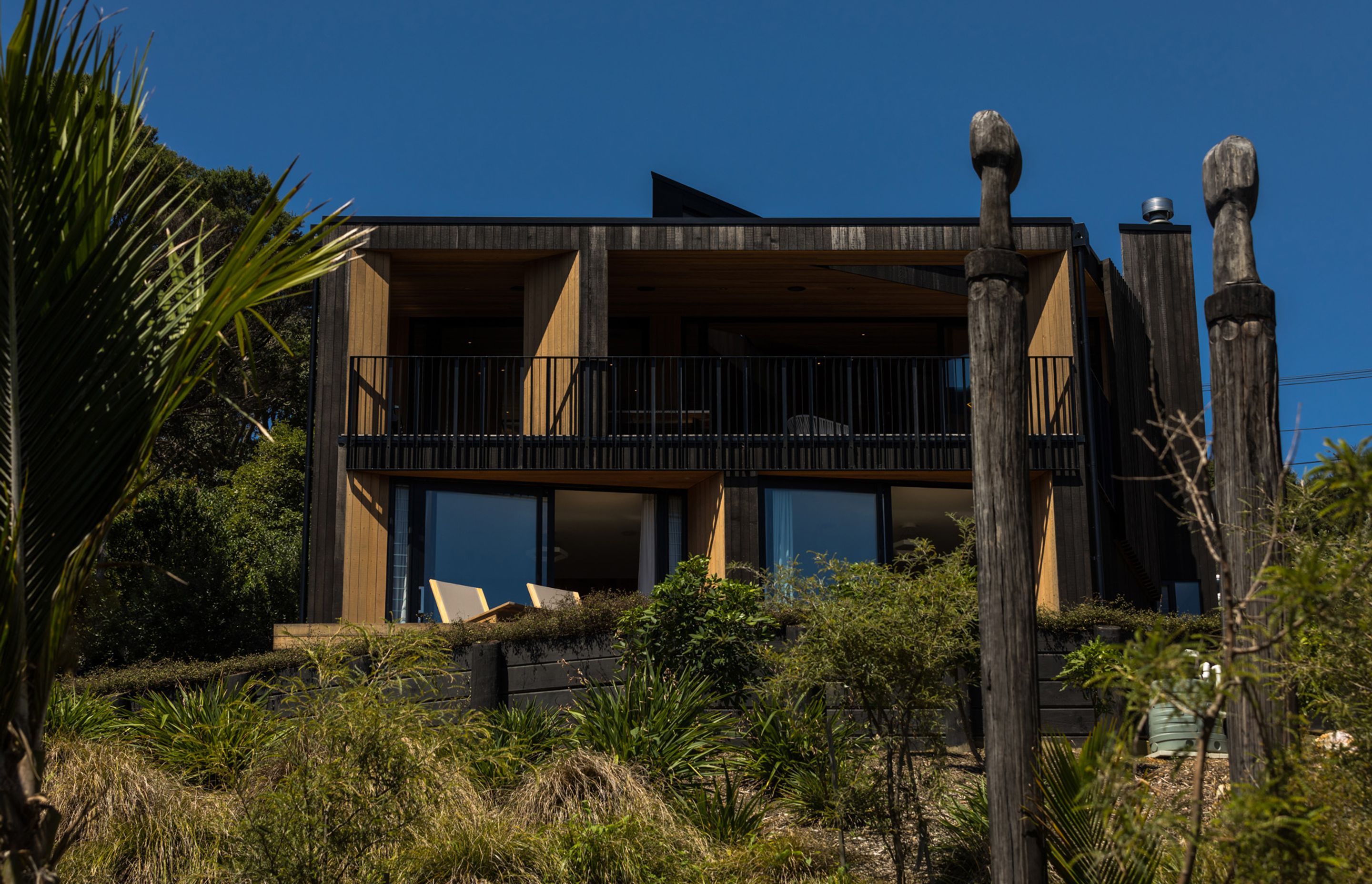 Regenerative planting of natives further serves to integrate the structure into its site.