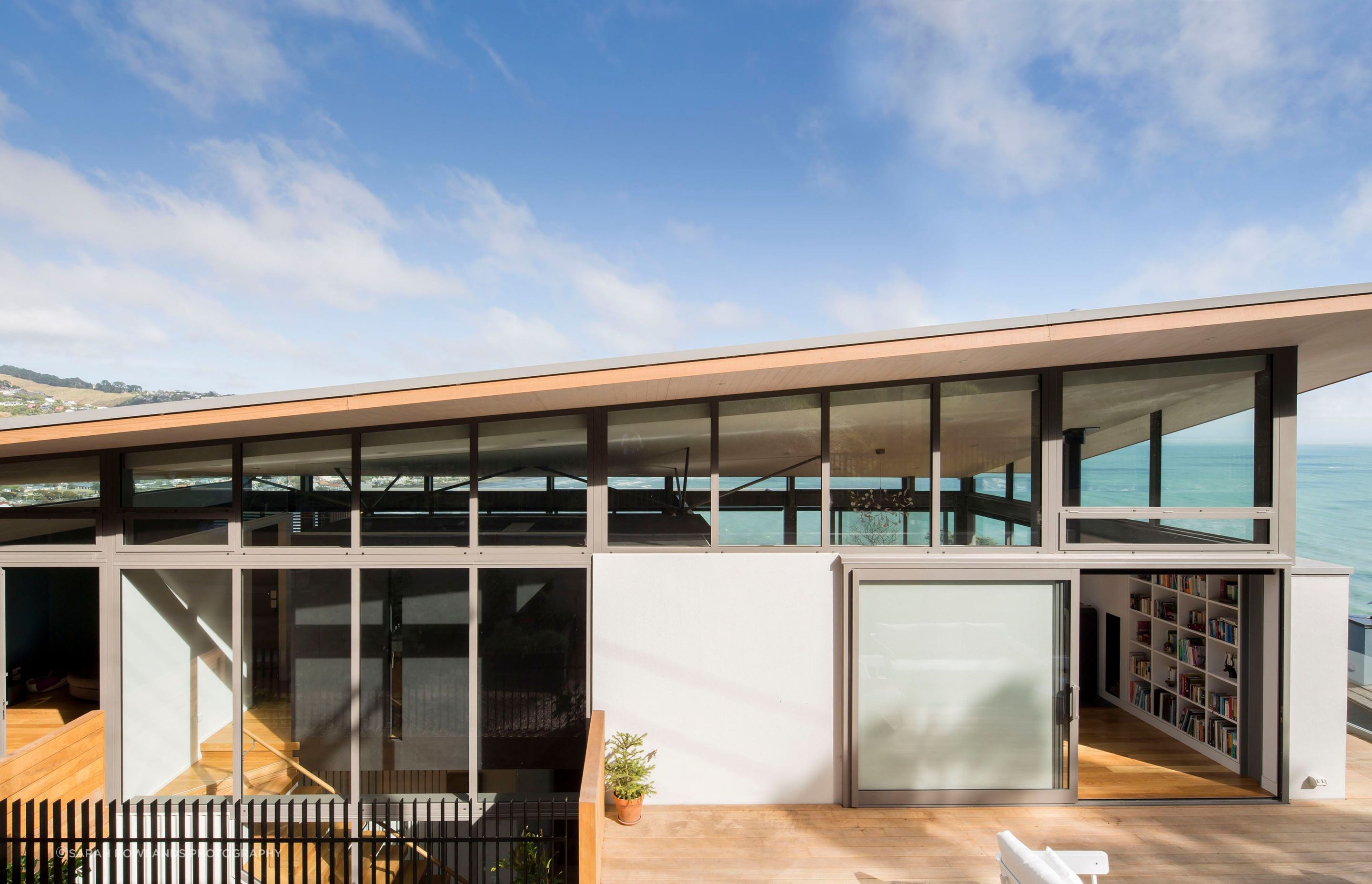 The east elevation showing the snug on the far left, main staircase in the centre and the terrace and lounge on the right.