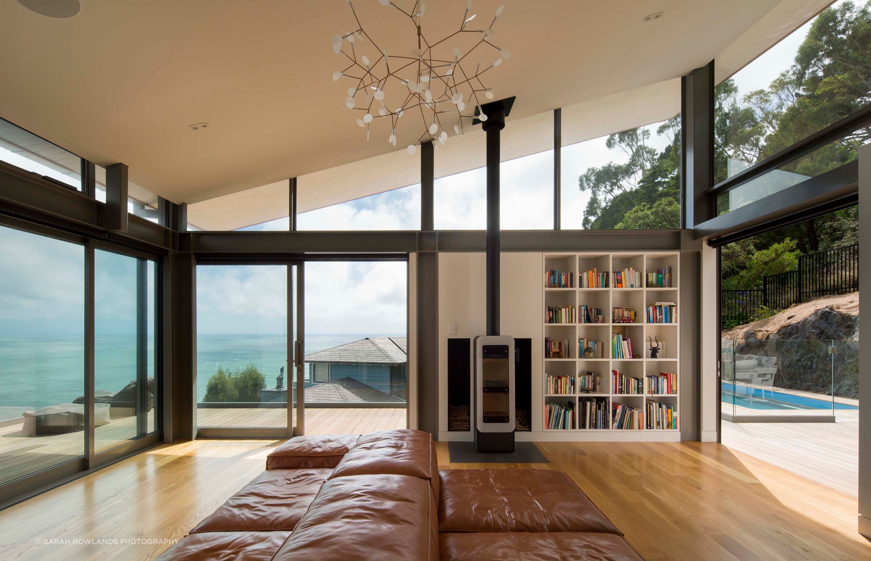 Looking north from the living room, which enjoys a double-aspect and elevated views to the reserve behind the house thanks to the raked ceiling and clerestory windows.