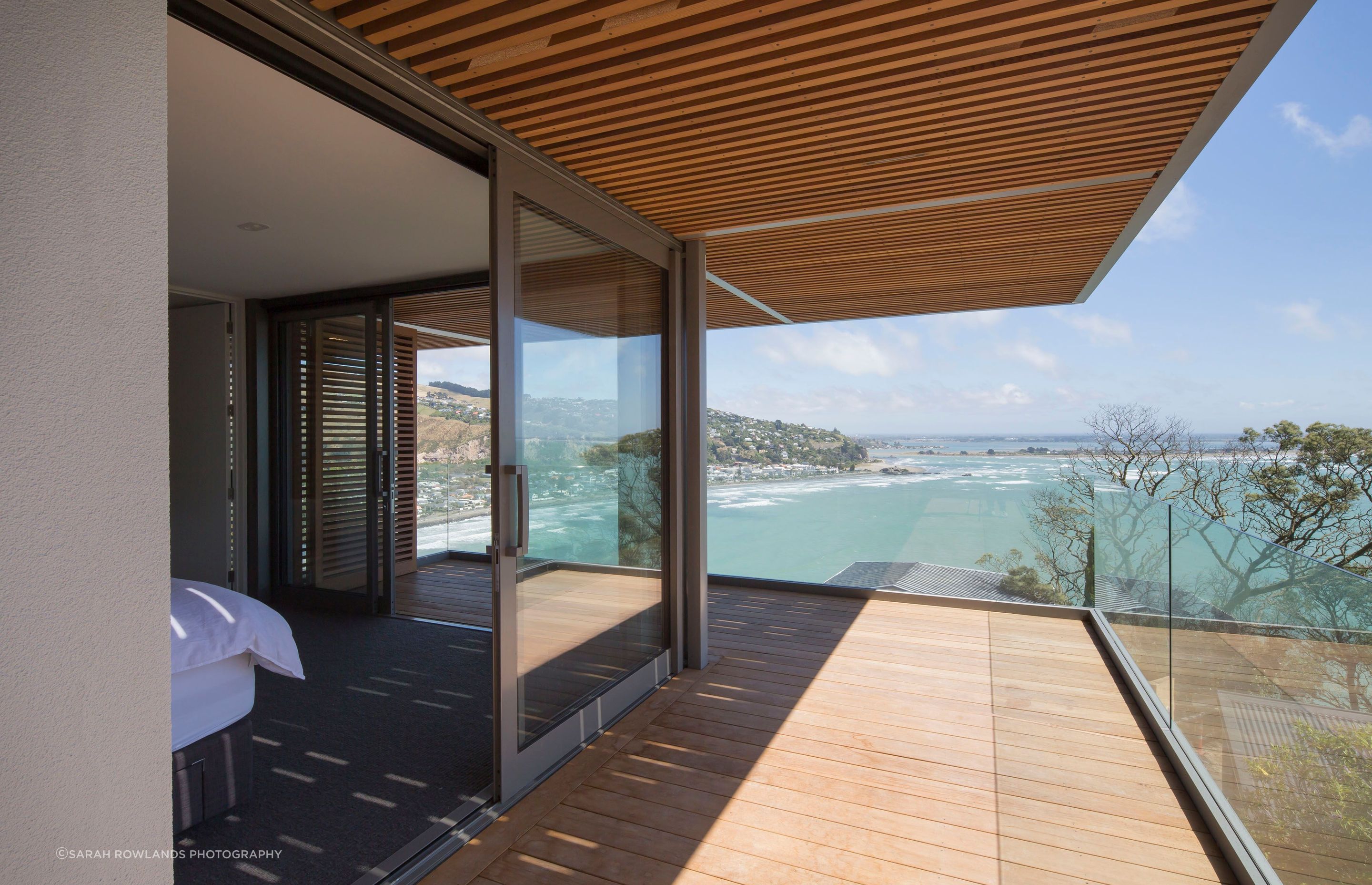 From its north-west corner position, the main bedroom enjoys wide-ranging views towards the Port Hills in the far distance.