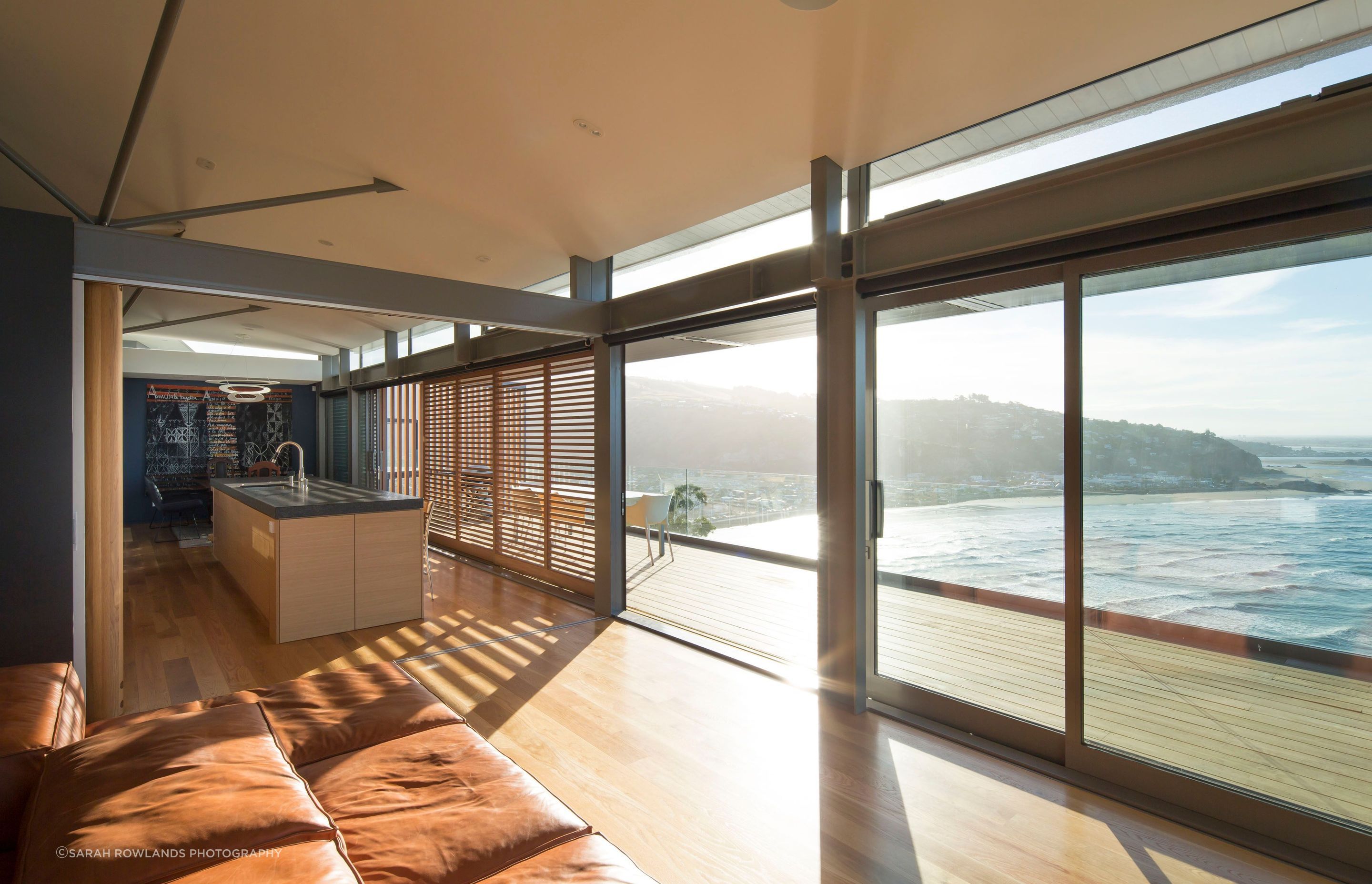 The western deck, with sliding shutters, enjoys 180-degree views from Sumner Beach through Pegasus Bay and out to the Pacific Ocean.