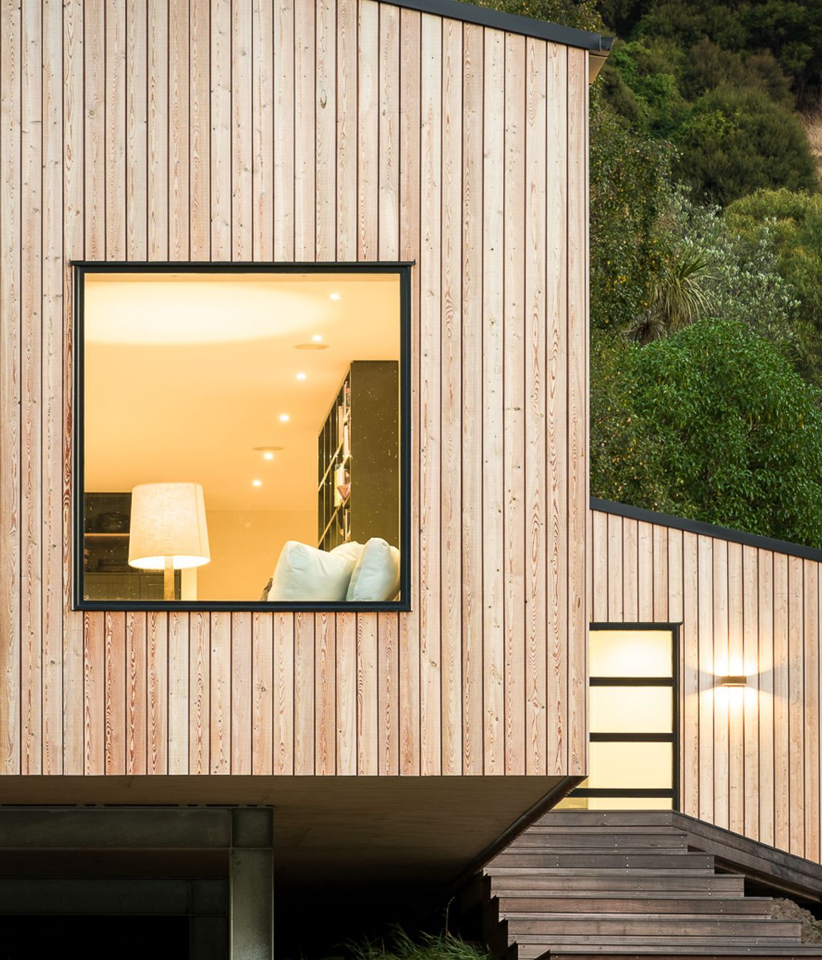 The entry stairs lead to an addition containing the entrance, bathroom and laundry.