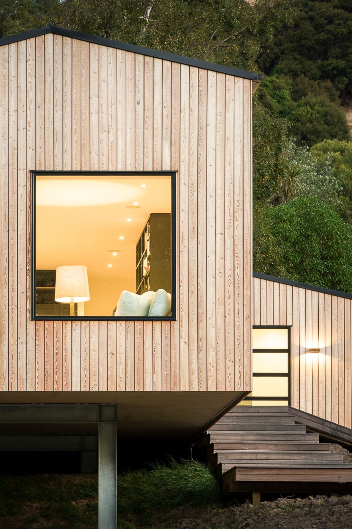 The entry stairs lead to an addition containing the entrance, bathroom and laundry.