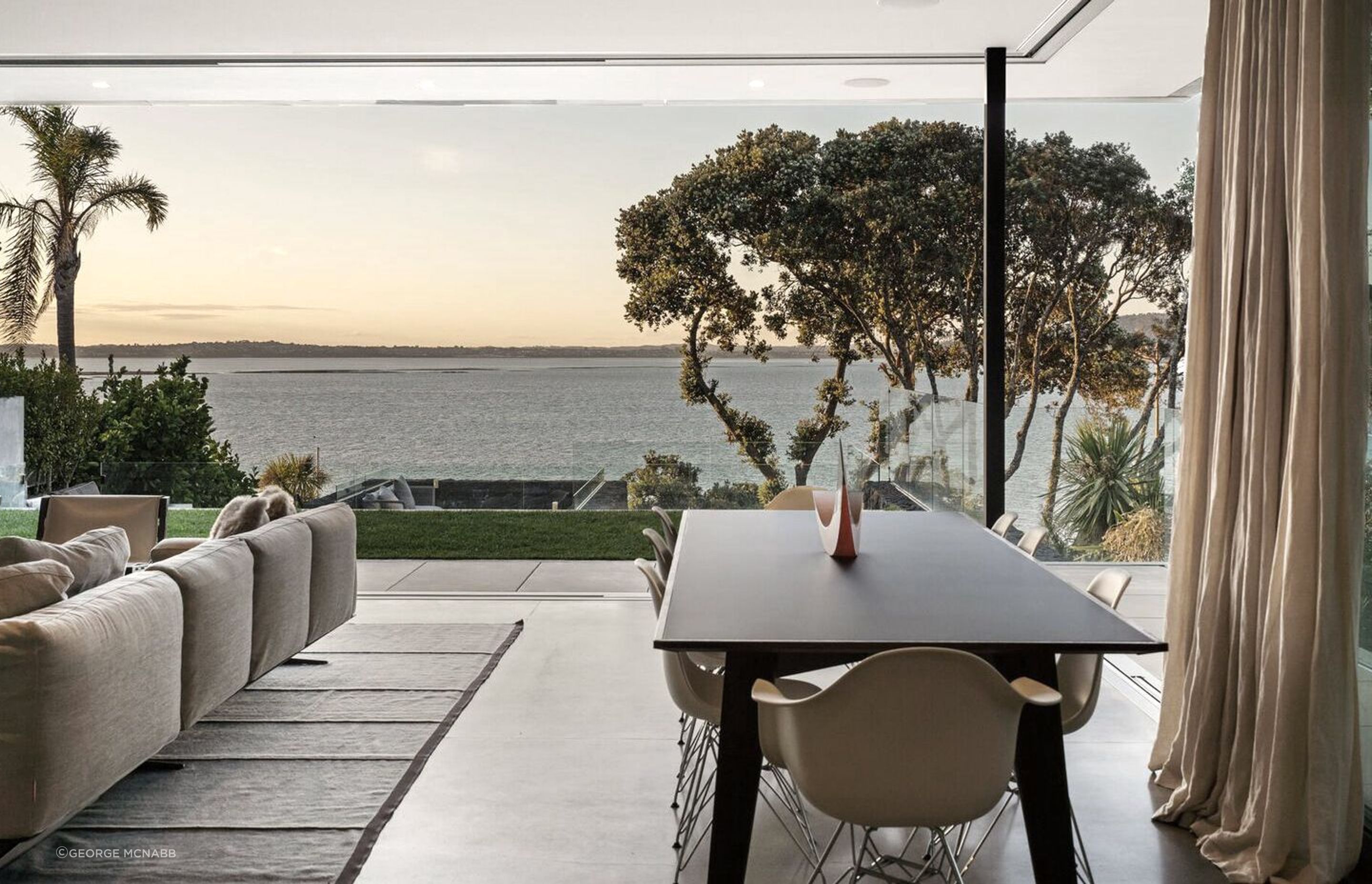 The owners enjoy a coastal lifestyle at Sea Wall House, which is only a 10-minute drive from the centre of Auckland city.