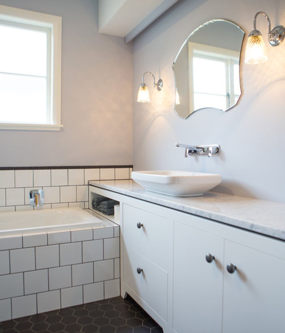 A cohesive palette of materials and design details work in this small space.