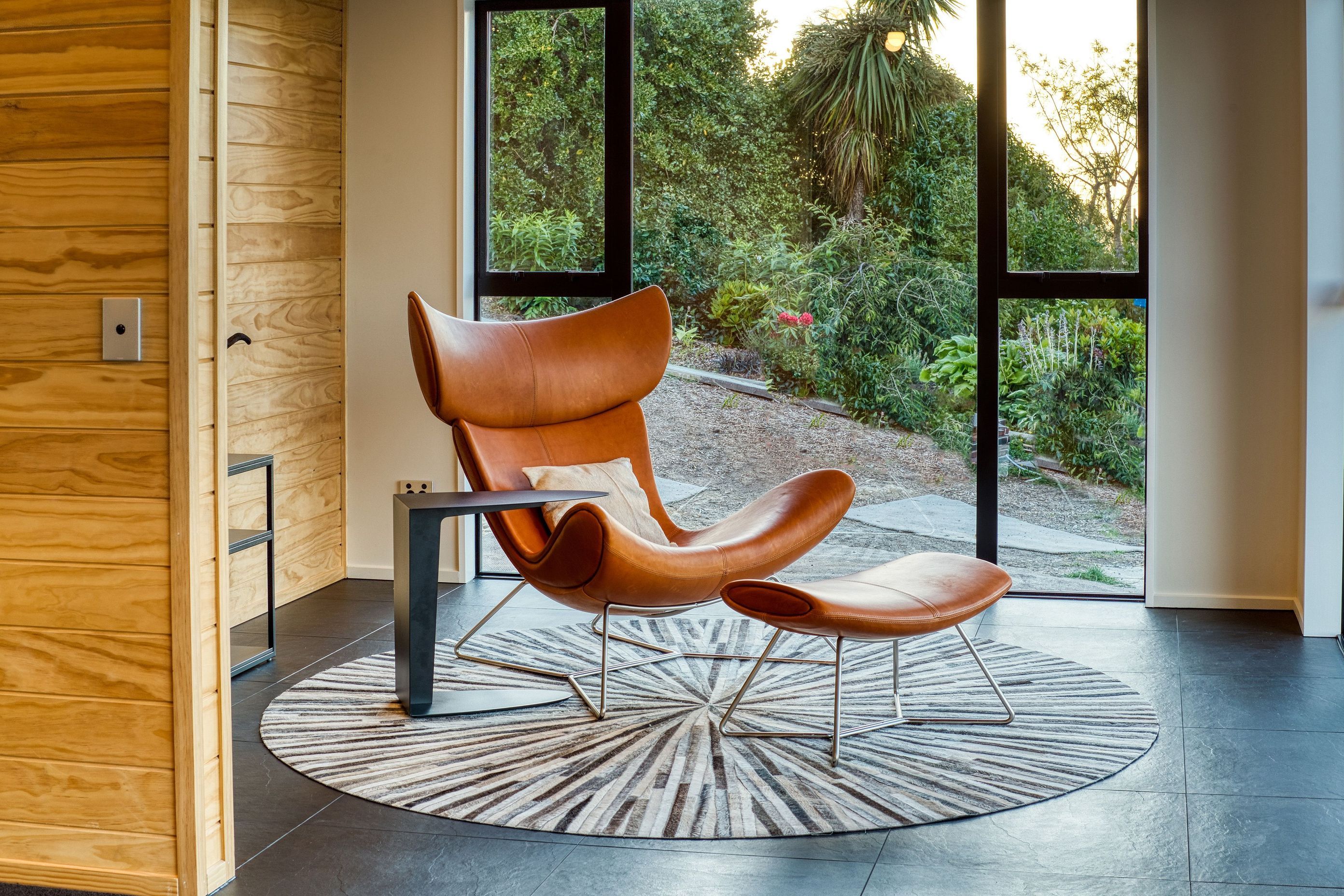 Super comfortable chair and sidetable here from BoConcept really matches the room