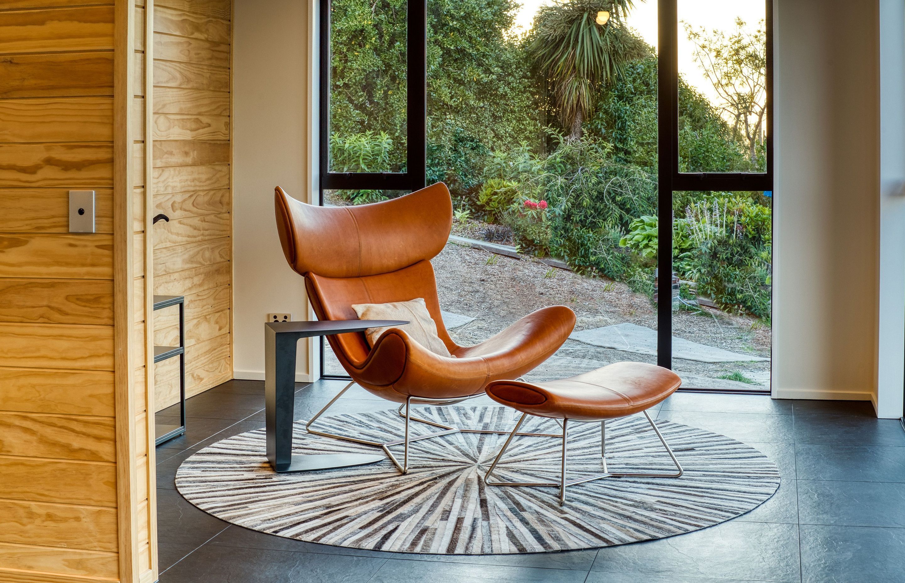 Super comfortable chair and sidetable here from BoConcept really matches the room