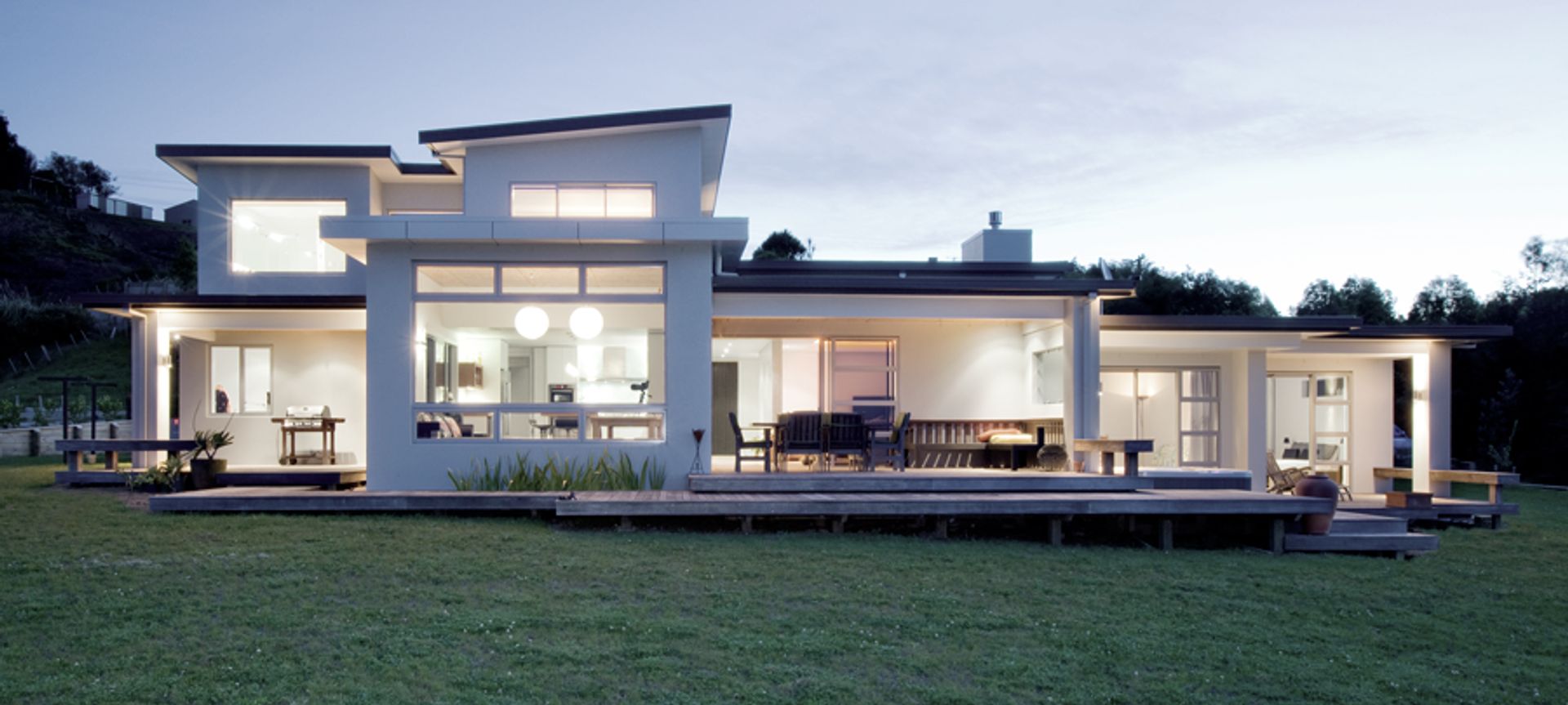 This contemporary four bedroom family home was built to take advantage of the city and coastal views this Minden site provided.