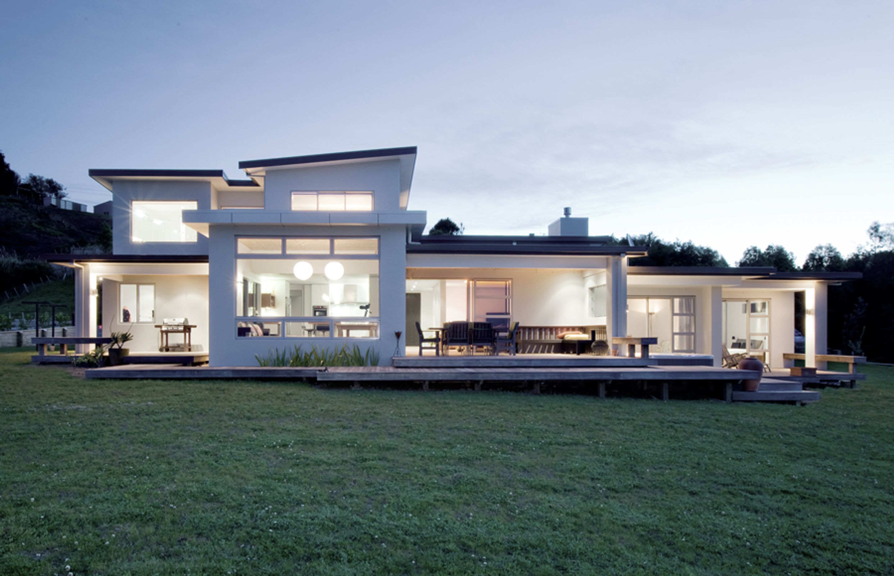 This contemporary four bedroom family home was built to take advantage of the city and coastal views this Minden site provided.