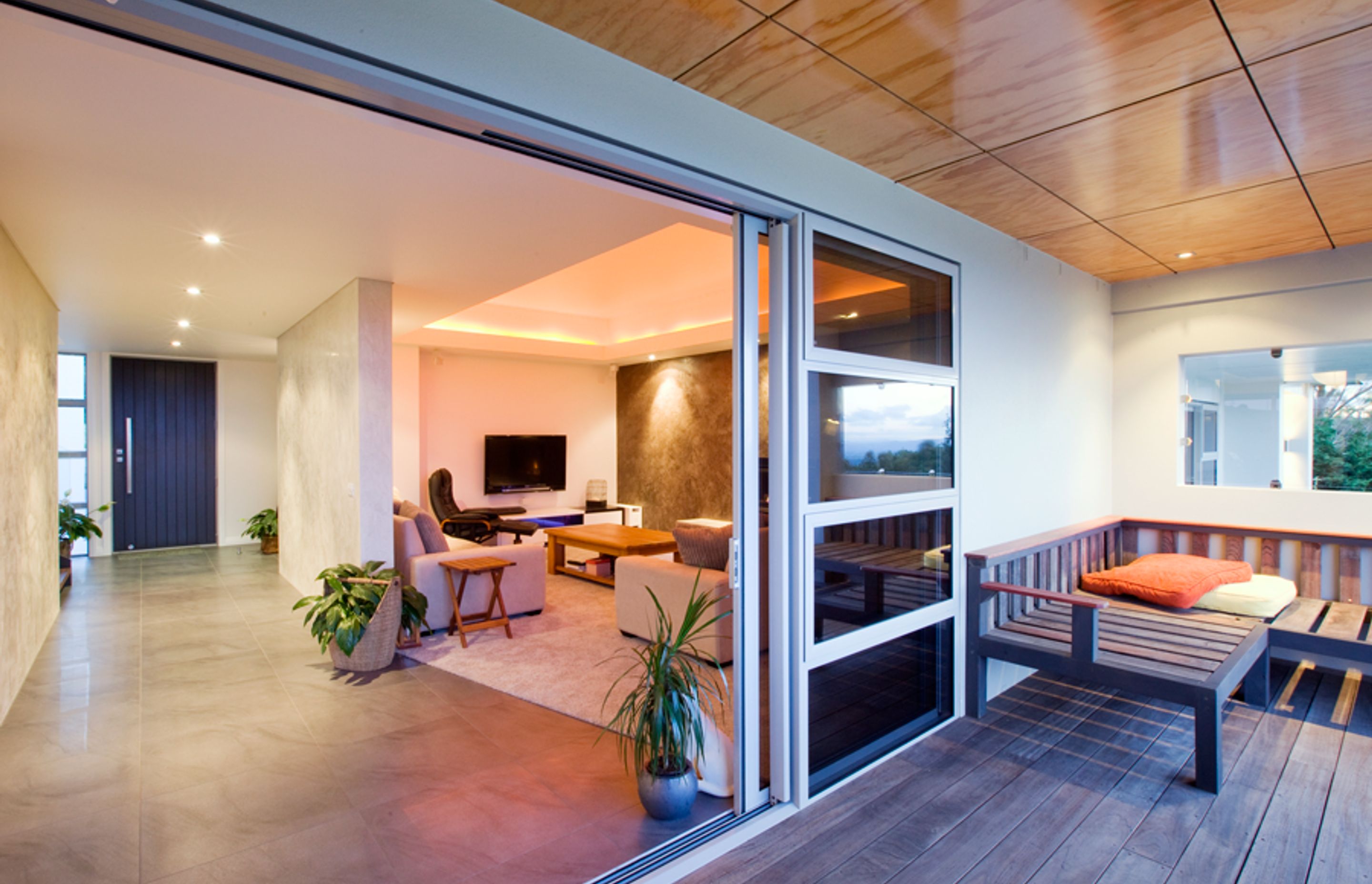 Timber panelled ceilings in the main living spaces also feature this negative detailing.