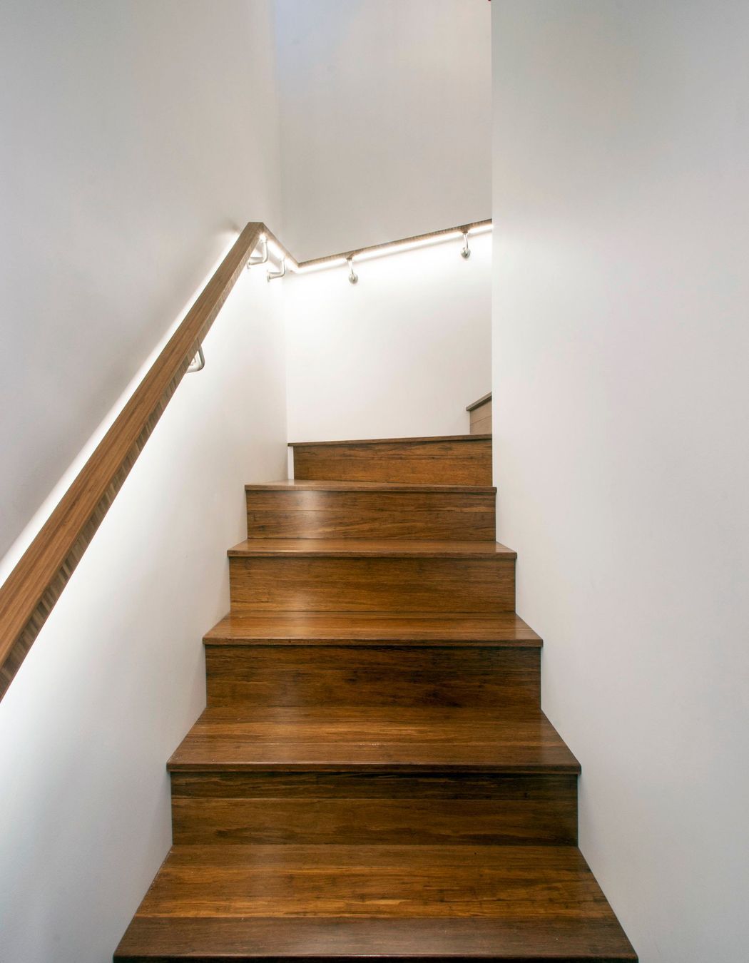 The staircase features bamboo treads.