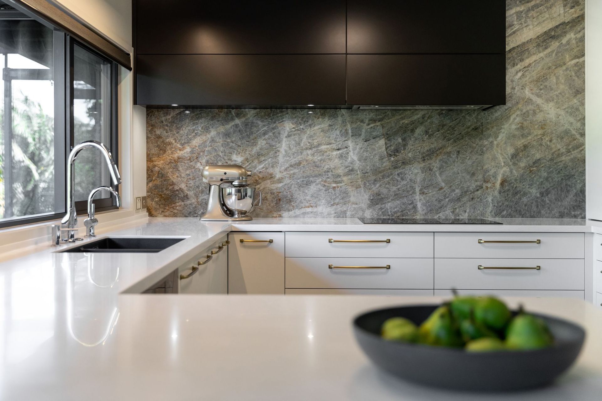 Corian benchtops were specified to deliver seamless corner joins and a smooth work surface.