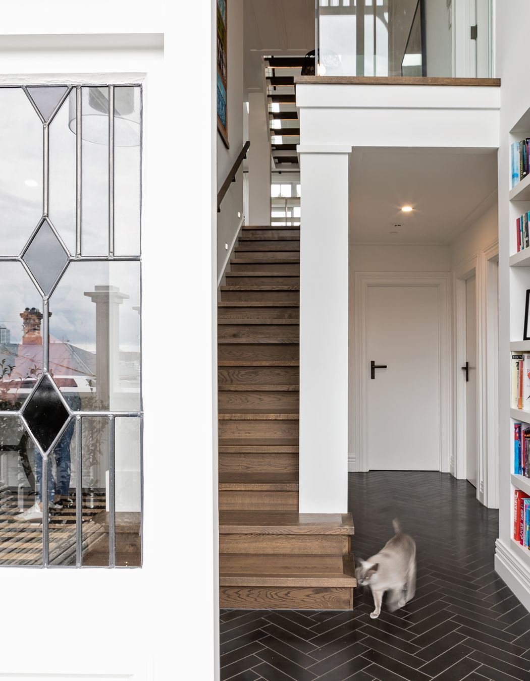 The basement level has a basalt tiled floor in a herringbone pattern.