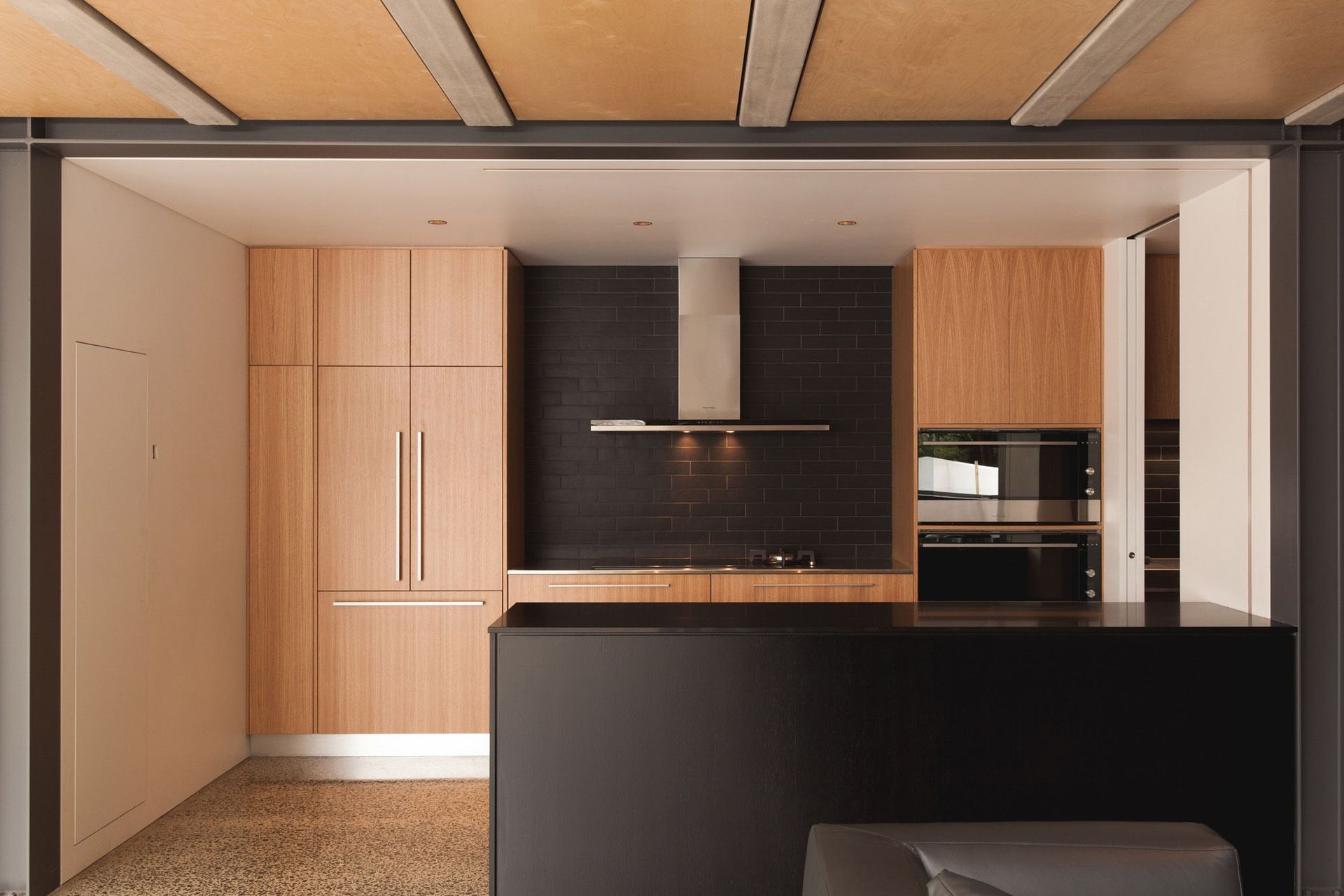 The lower level consists of a large kitchen with scullery, dining and lounge.