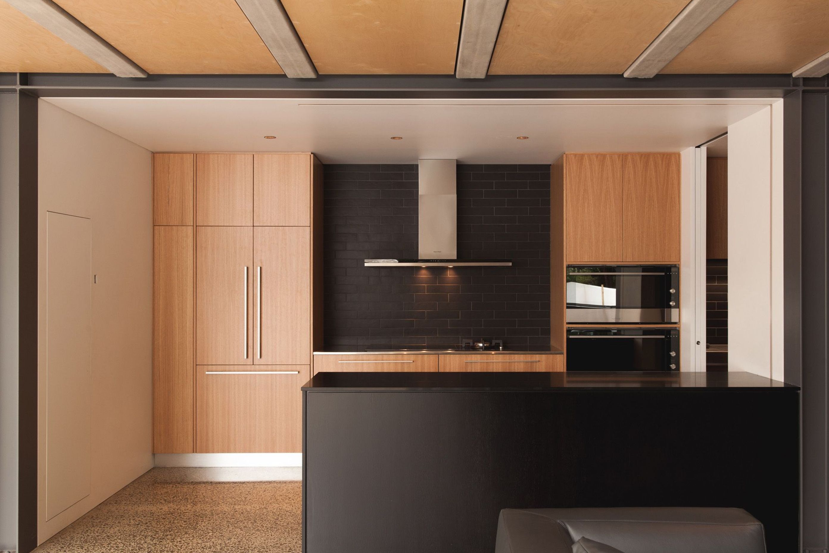 The lower level consists of a large kitchen with scullery, dining and lounge.