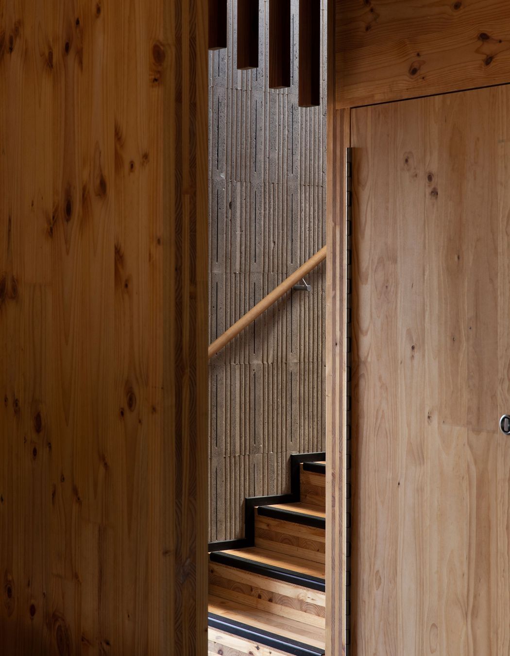 The stairwell to the upper level is constructed from insulated concrete form paneling.