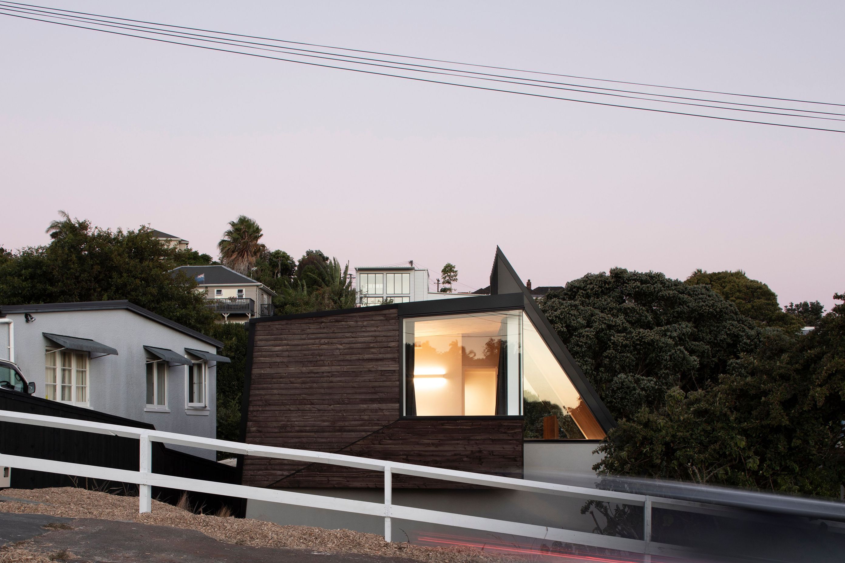 The narrow site of the Tuarangi house bears more resemblance to a Wellington hillside, than a typical plot in Grey Lynn, Auckland.