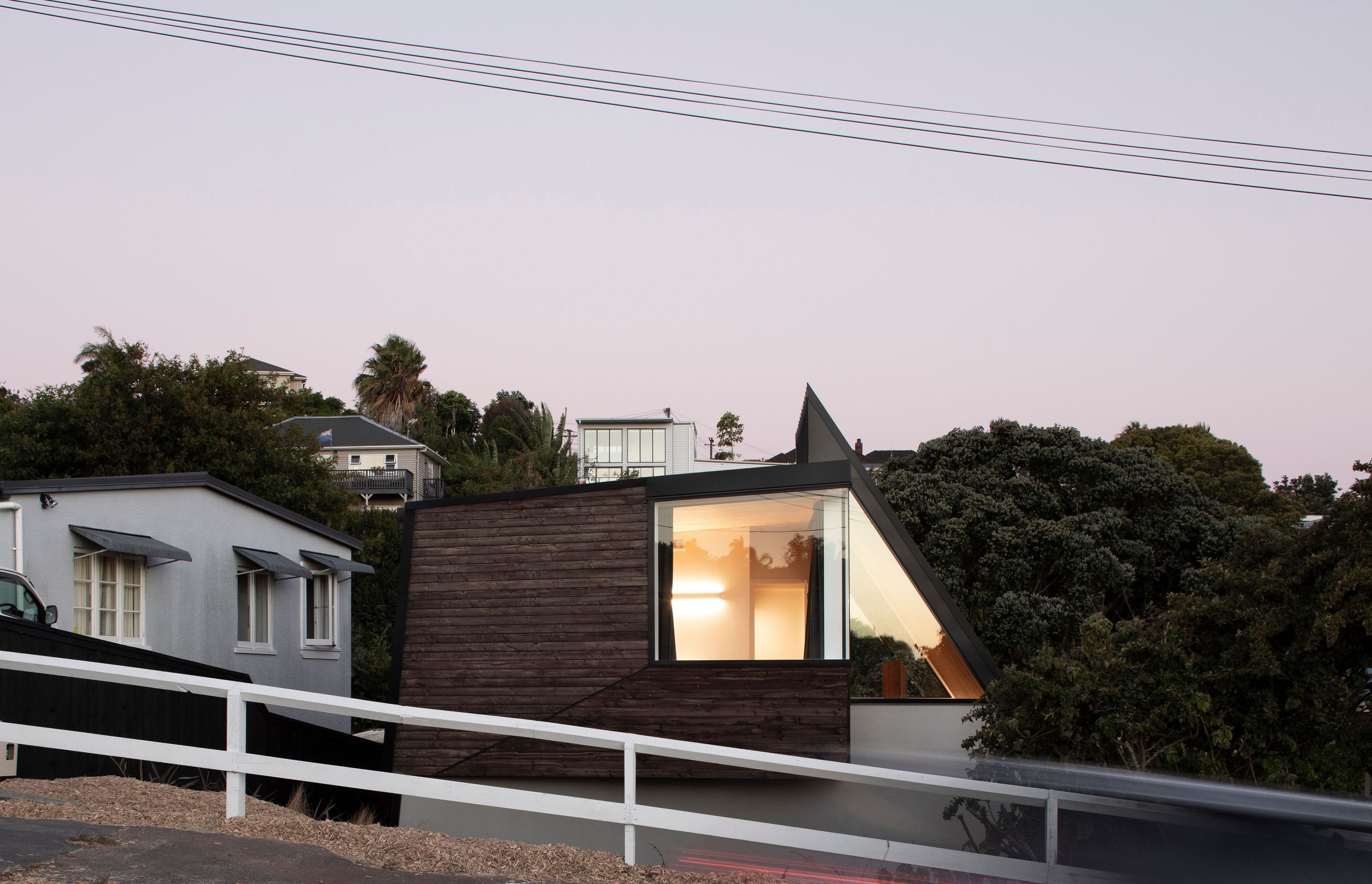 The narrow site of the Tuarangi house bears more resemblance to a Wellington hillside, than a typical plot in Grey Lynn, Auckland.