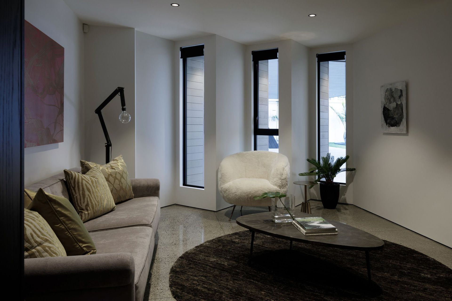 The media room off the living area on the ground floor offers an alternative space for relaxation and entertainment.