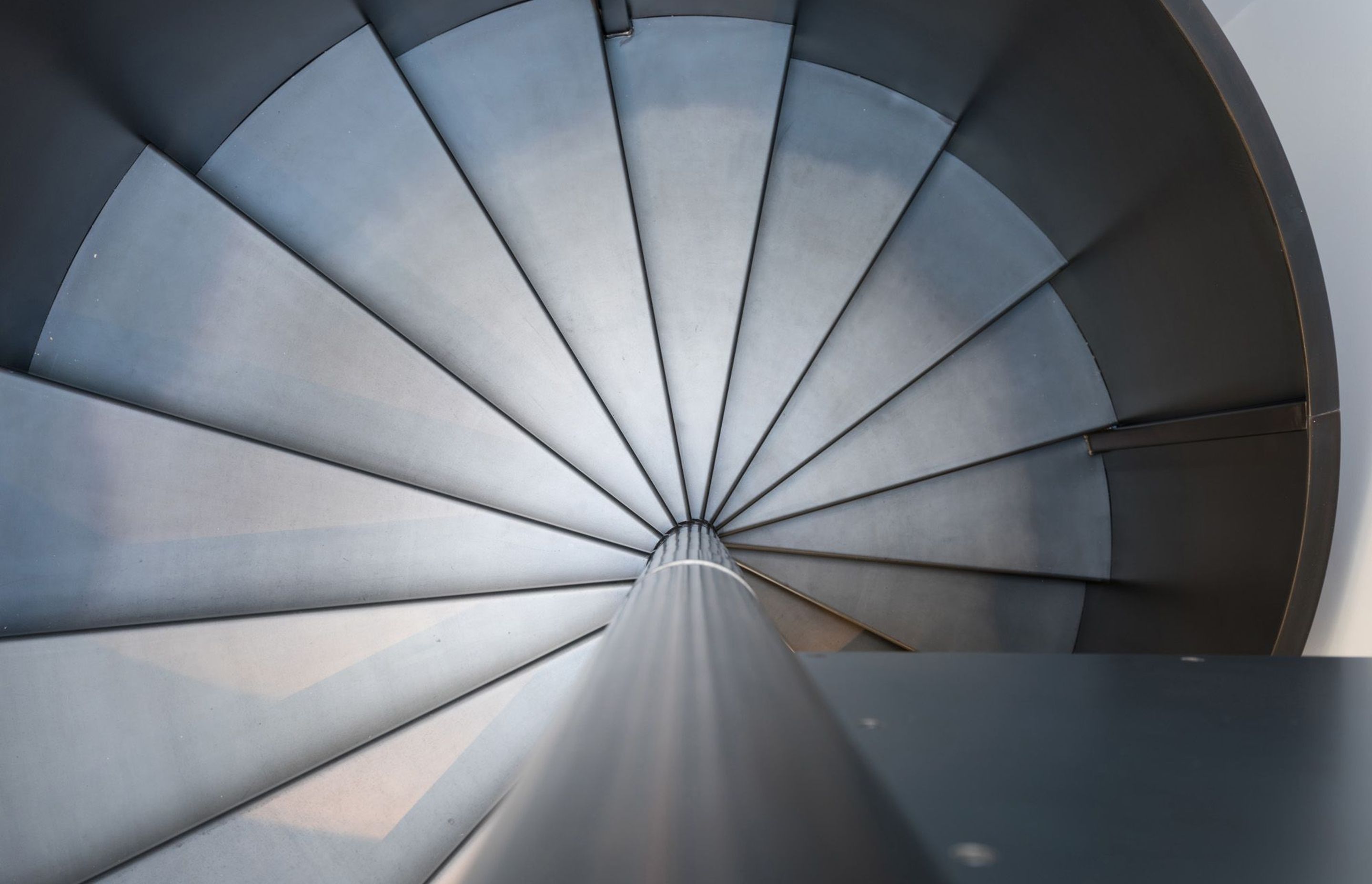 The view down the spiral staircase is like a work of art.