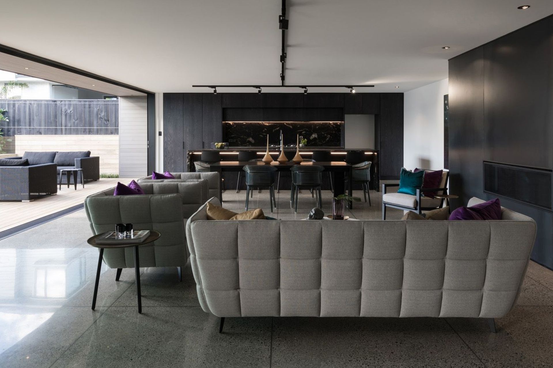 Open-plan living seamlessly flows from the courtyard into the interior, making this home a great place for parties.