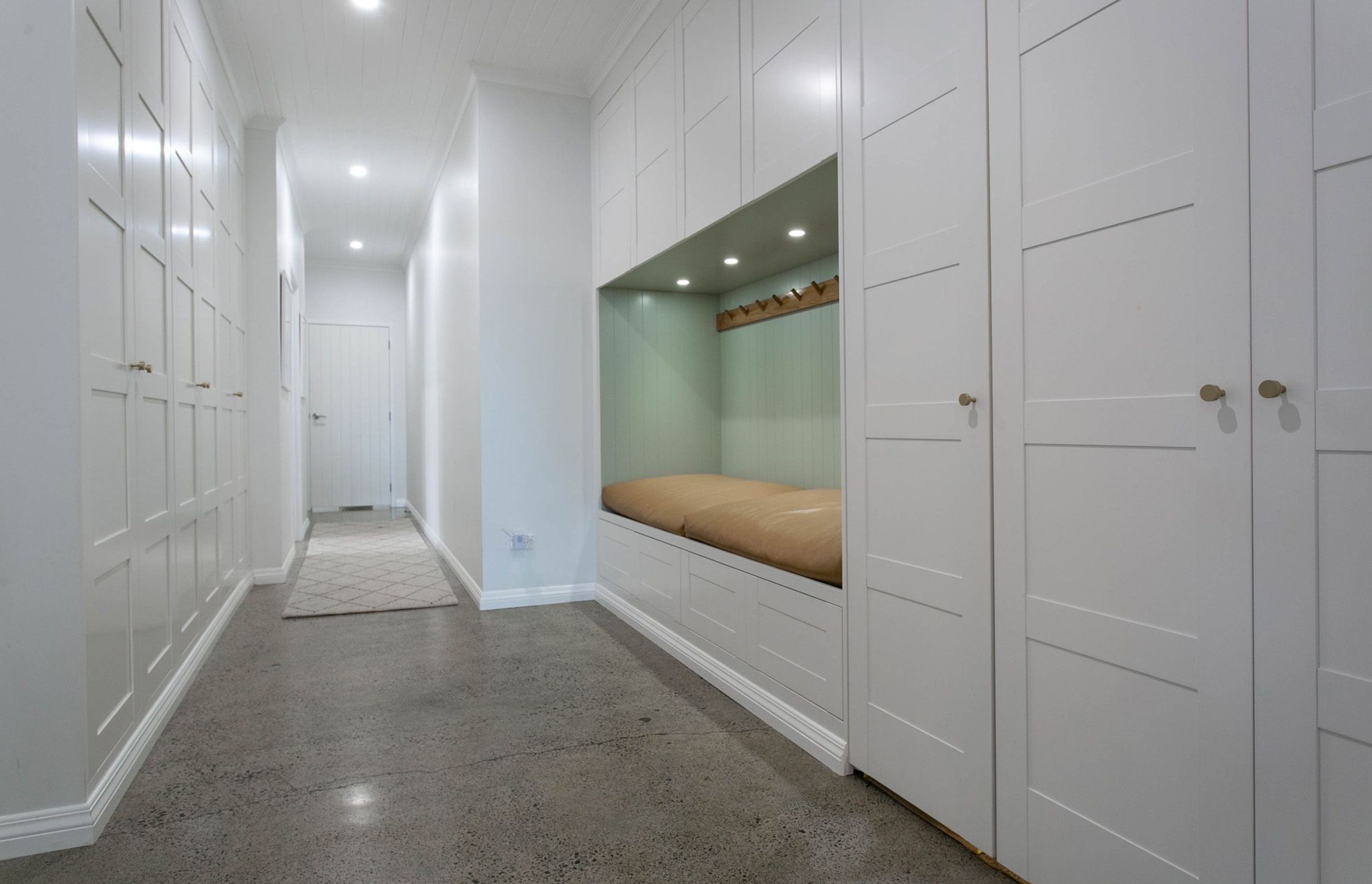 Hallway storage with daybed