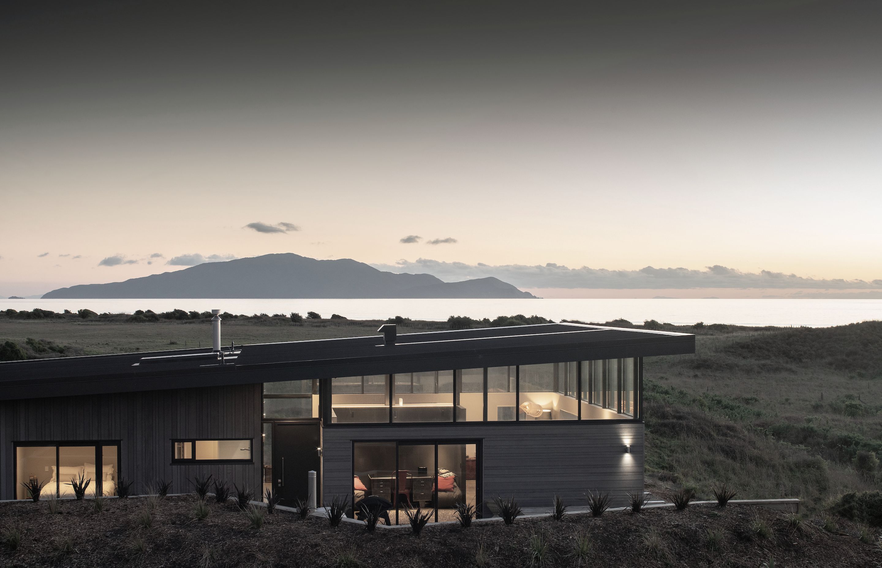 The view across the dunes and water towards Kapiti Island was a significant factor in the siting of the house.