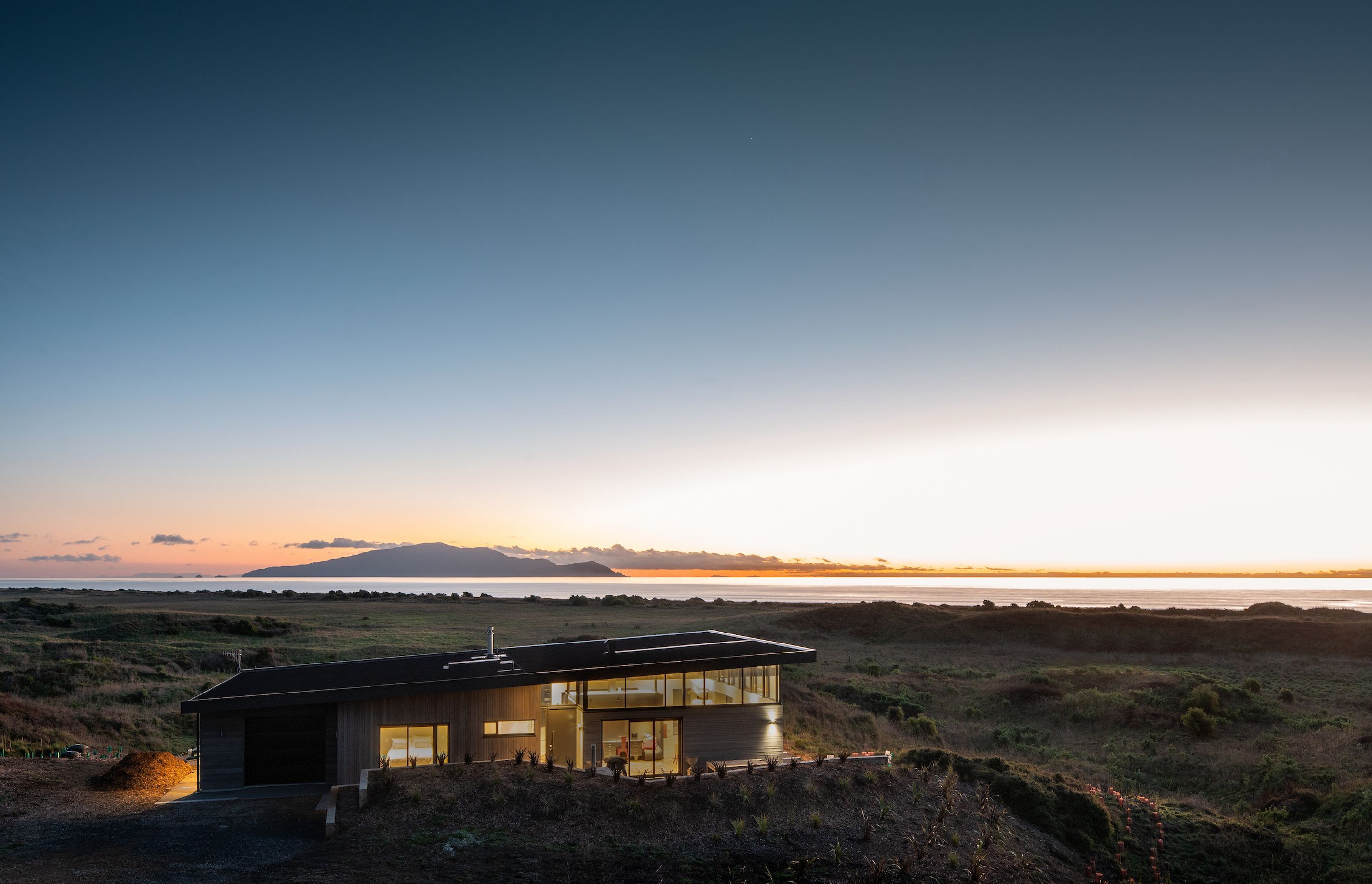 Situated just 300m from the water's edge at Te Horo Beach, this house has been designed so that it can transition from being a holiday house to a full-time residence.