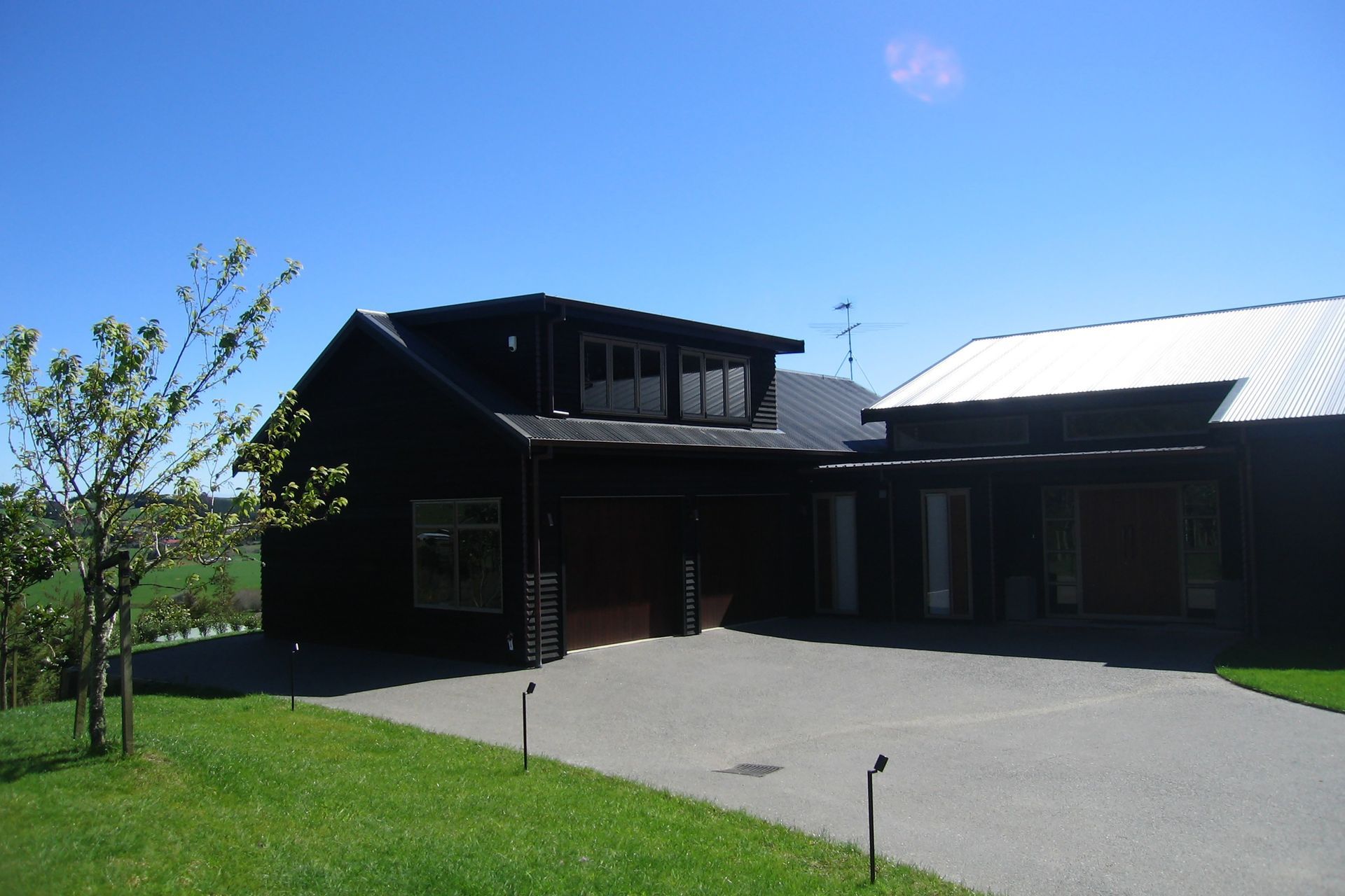 An attic space above the garage faces the northern sunny aspect.